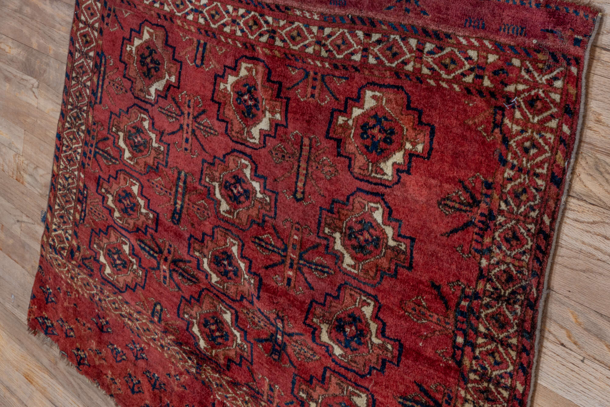 2' x 4' one-of-a-kind handmade vintage Torkaman small size rug. Color palette: brown, gray, pink, red