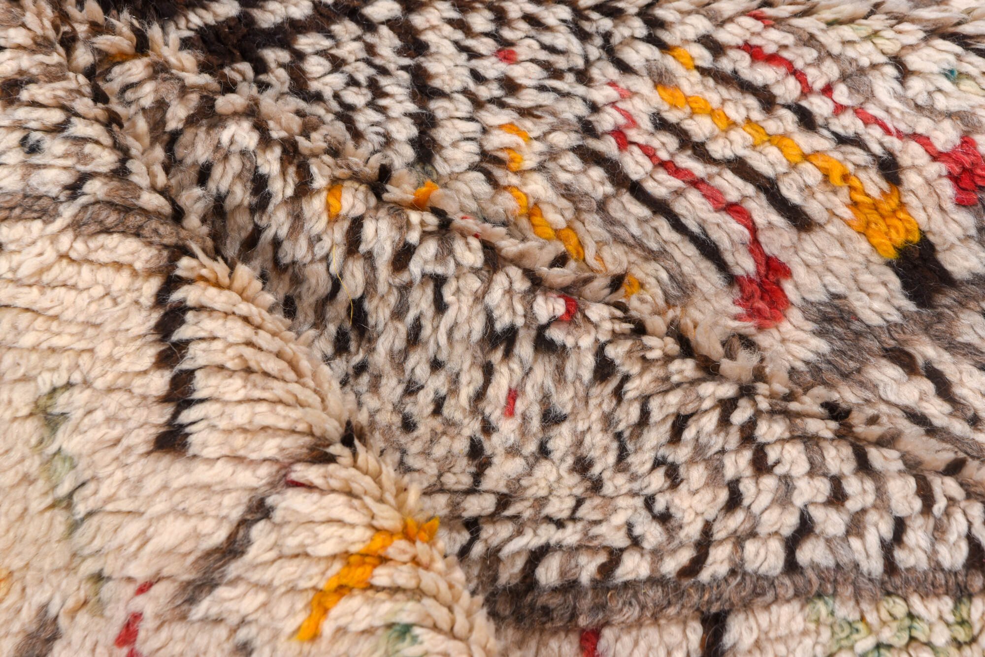 4' x 8' one-of-a-kind handmade vintage Moroccan rug. Color palette: brown, gray, light gray, off-white, orange, peru, pink