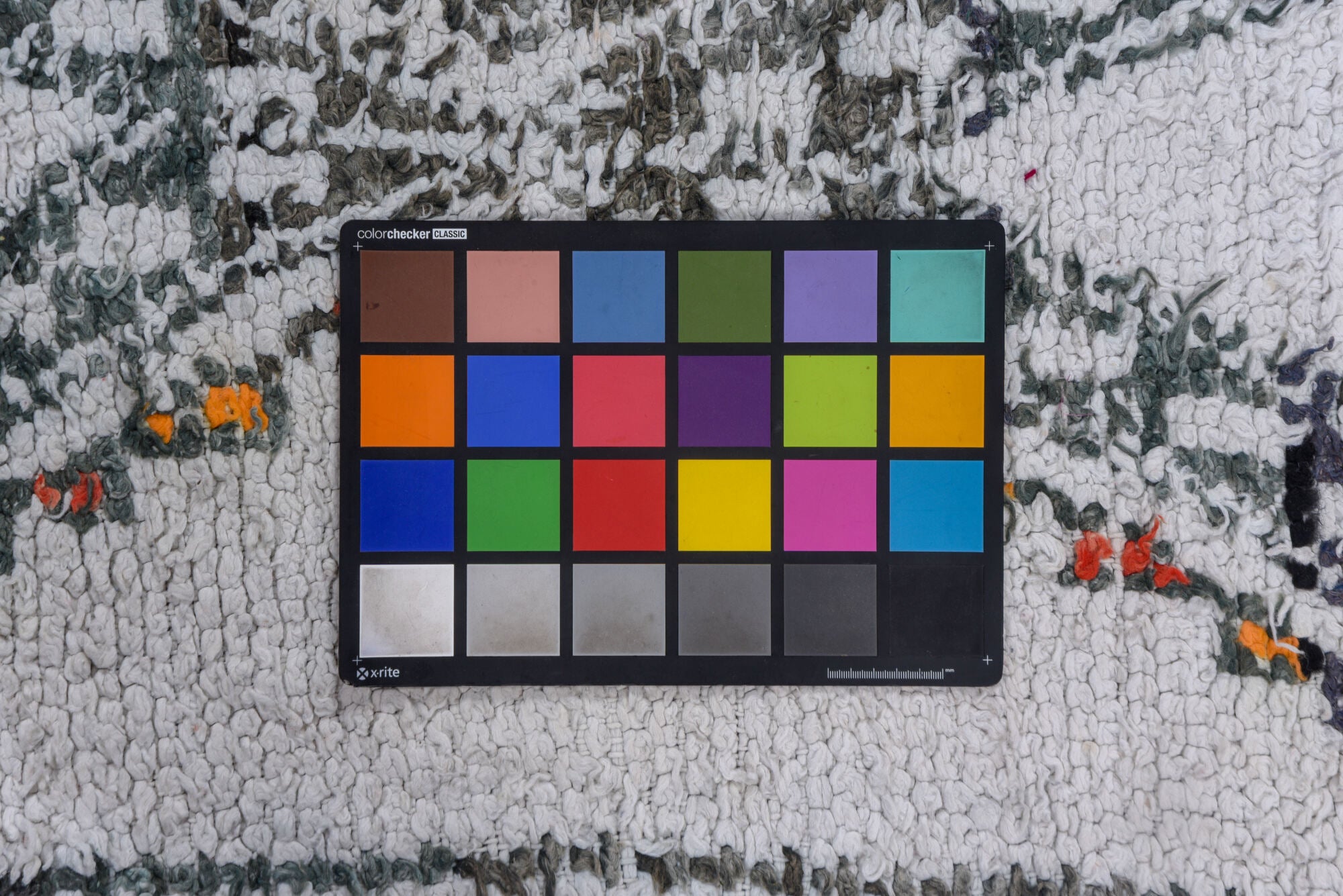 5' x 8' one-of-a-kind handmade vintage Moroccan medium size rug. Color palette: black, brown, charcoal, dark gray, dim gray