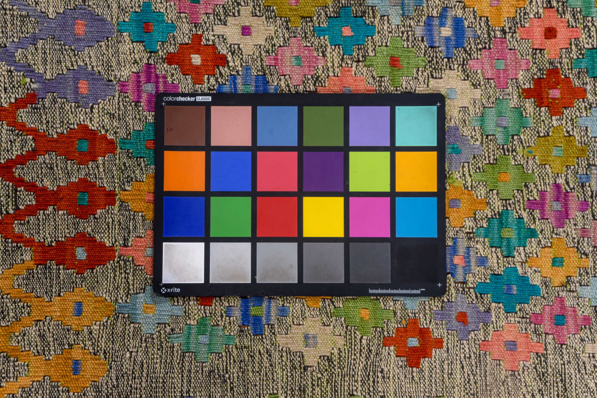 6' x 7' one-of-a-kind handmade vintage Kilim rug. Color palette: blue, brown, dark cyan, gray, green, orange, peru, pink