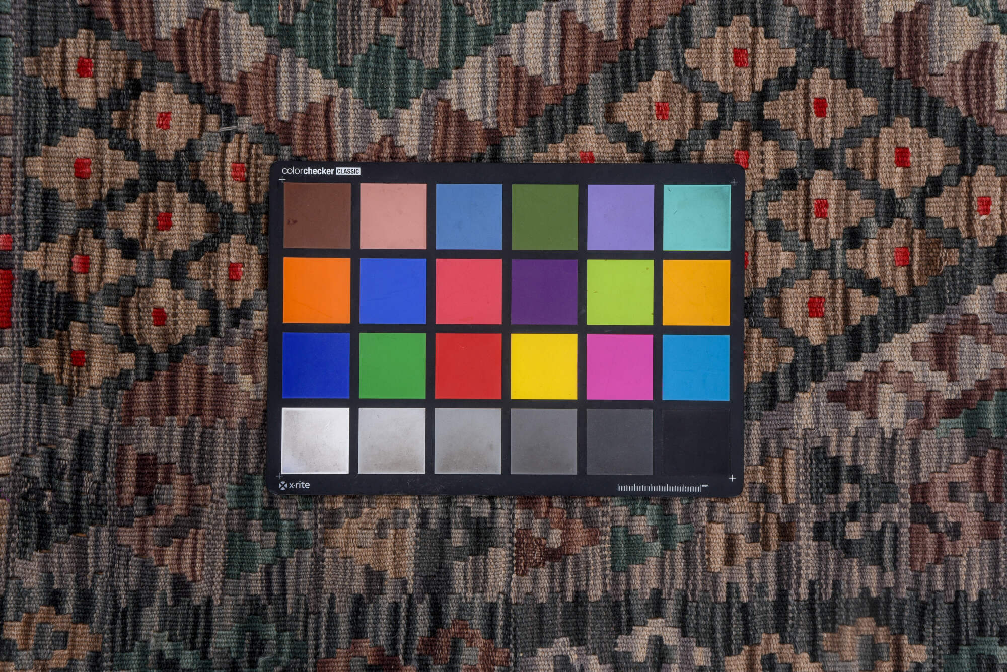 6' x 7' one-of-a-kind handmade vintage Kilim rug. Color palette: black, brown, burgundy, charcoal, dim gray, gray, pink, red