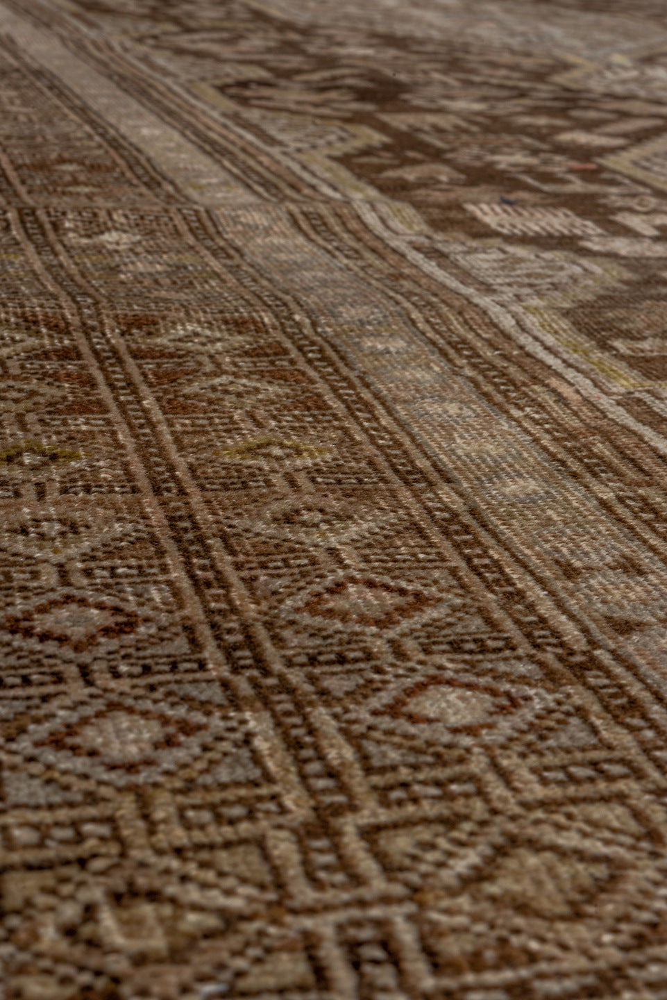 4' x 6' one-of-a-kind handmade vintage Caucasian small size rug. Color palette: brown, gray