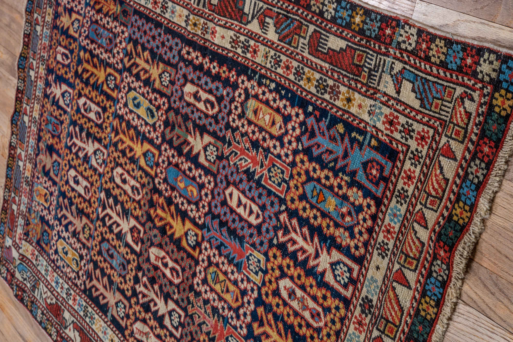 3' x 4' one-of-a-kind handmade vintage Shirvan small size rug. Color palette: black, blue, brown, gray, red