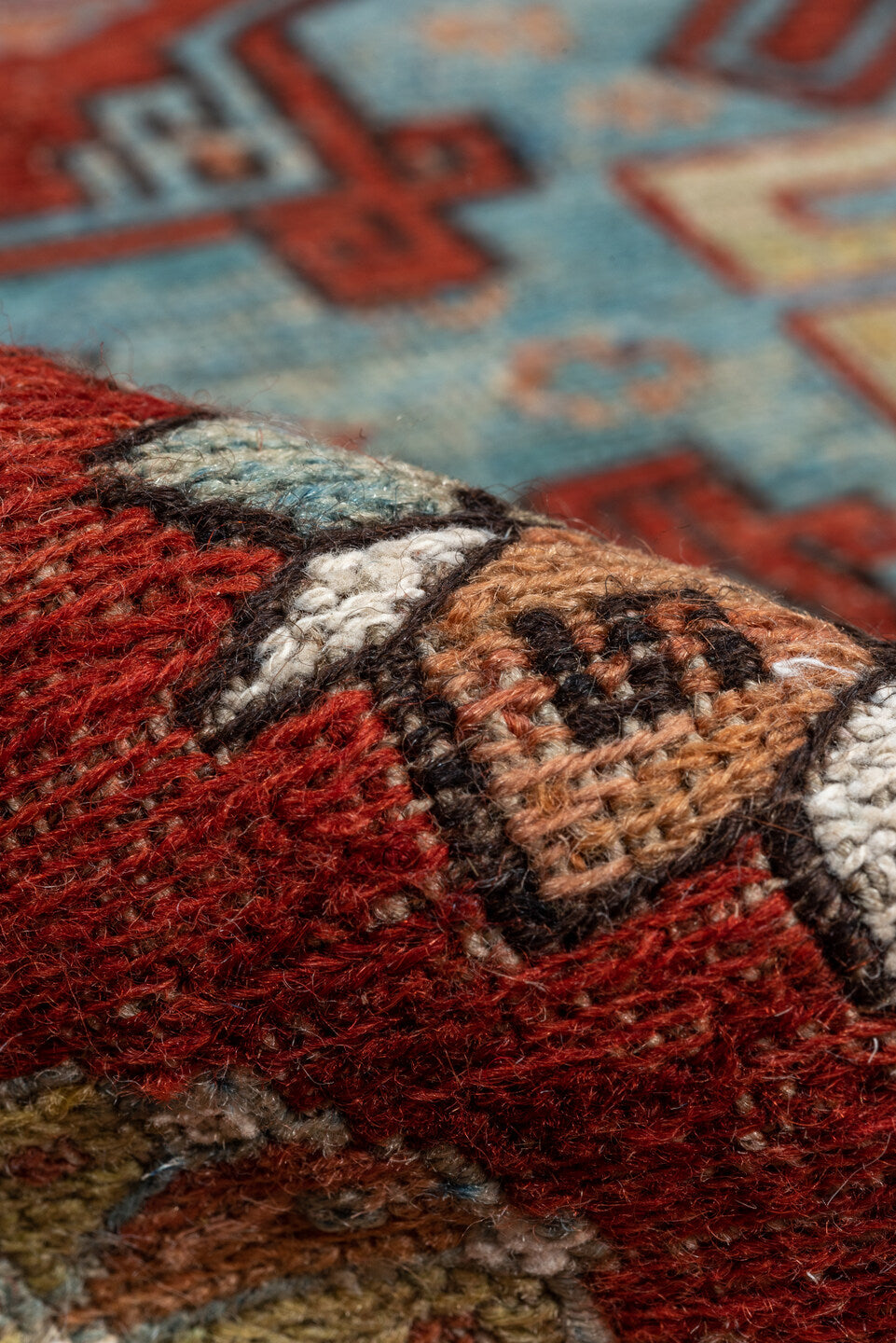 6' x 8' one-of-a-kind handmade vintage Sumak medium size rug. Color palette: blue, gray, brown, red, off-white, black