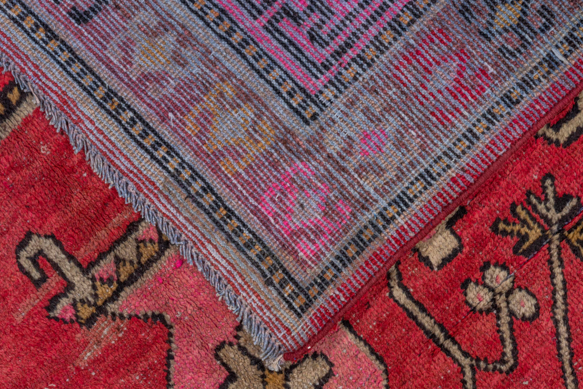 4' x 8' one-of-a-kind handmade vintage Khotan rug. Color palette: black, brown, pink, red