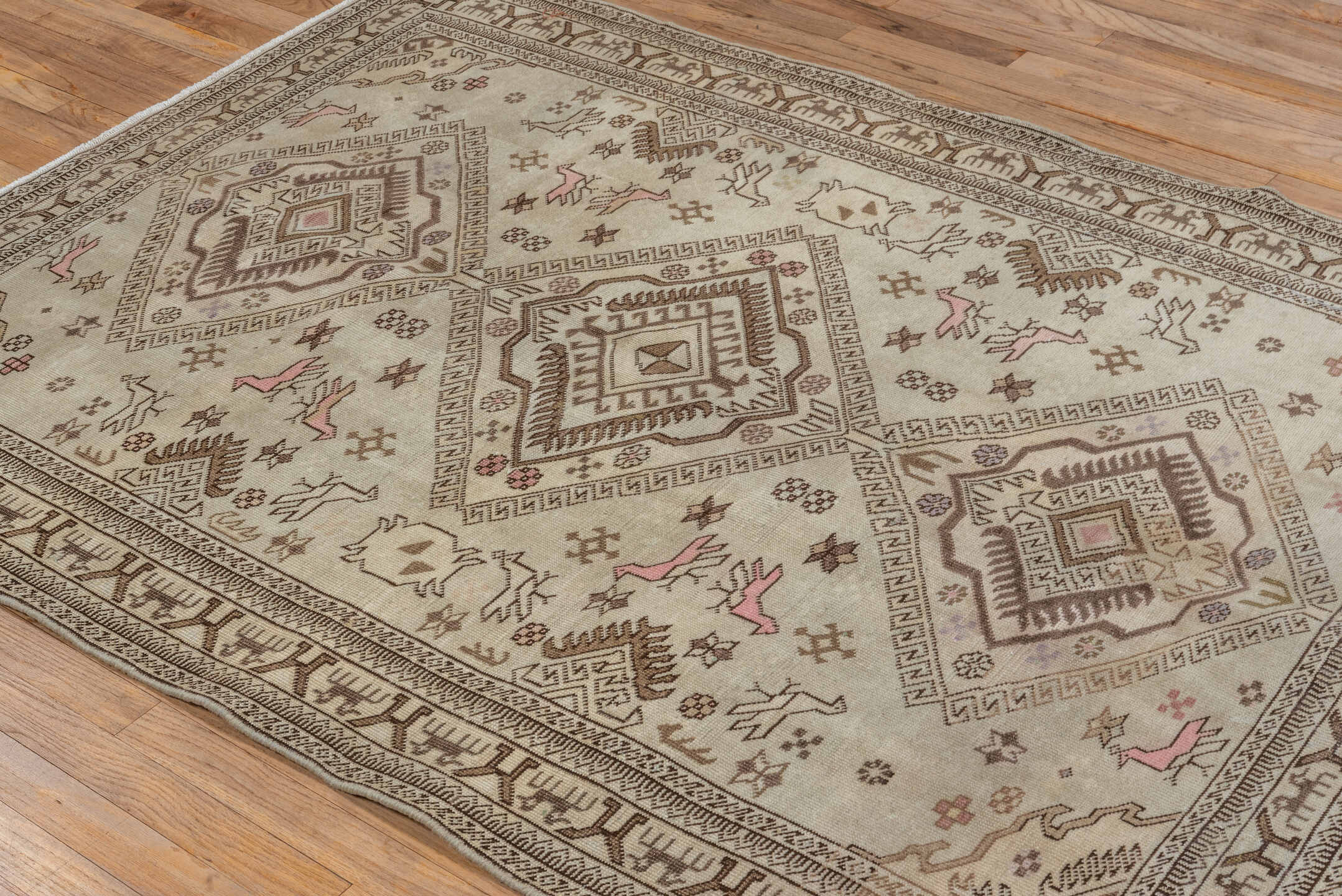 4' x 6' one-of-a-kind handmade vintage  small size rug. Color palette: gray, brown, light gray, off-white, pink, orange