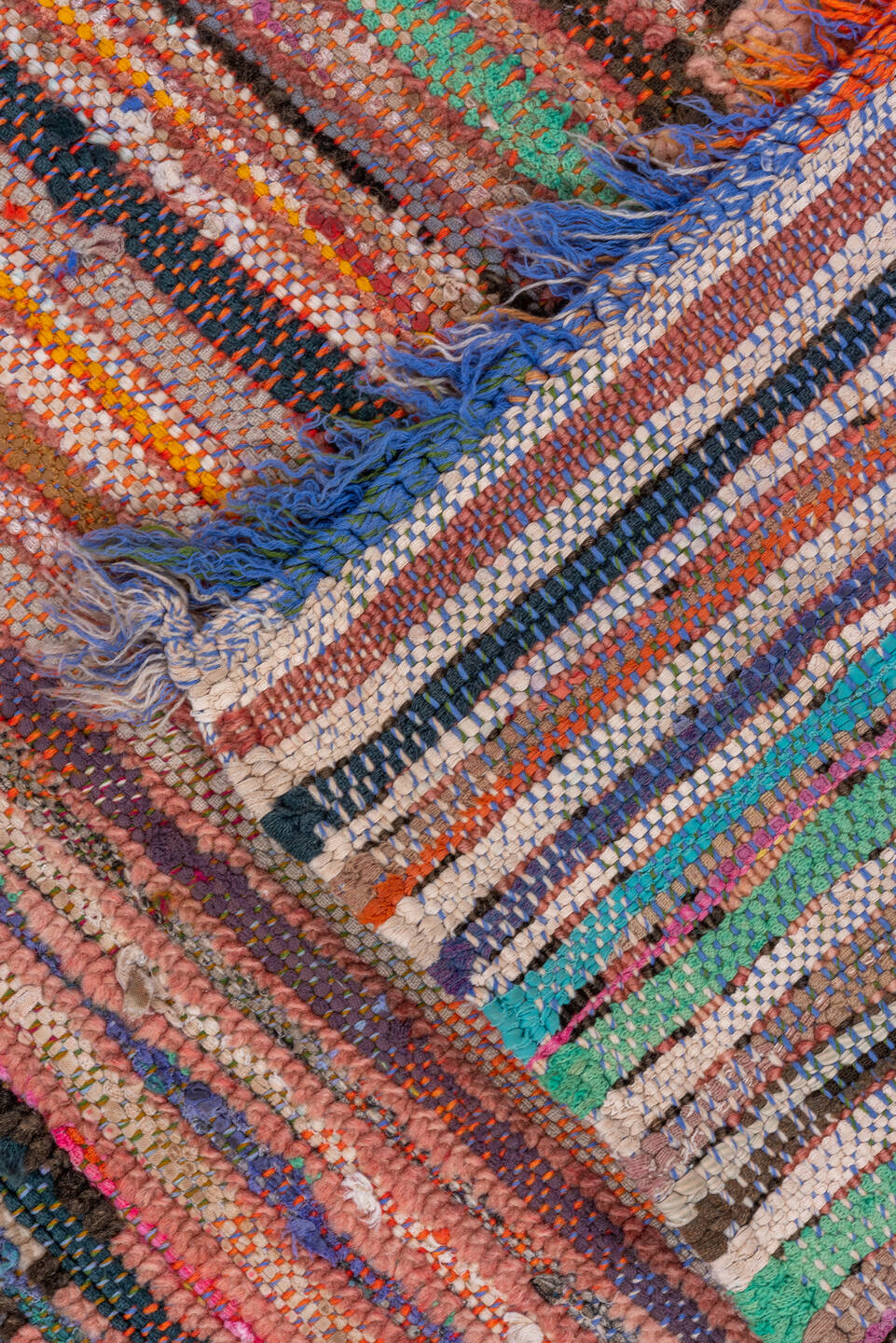 3' x 8' one-of-a-kind handmade vintage Moroccan runner rug. Color palette: pink, brown, blue, green, gray, red, orange