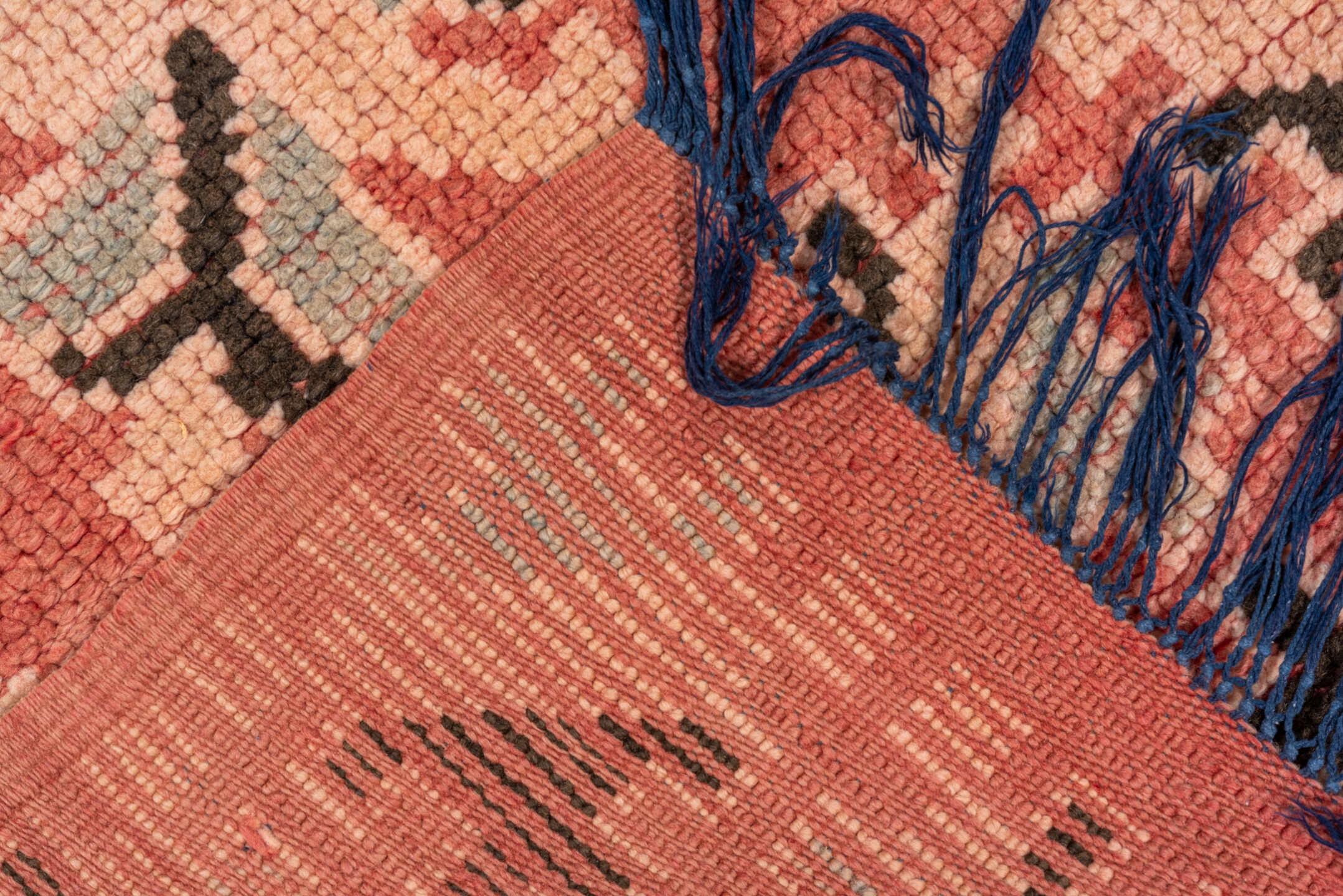 3' x 11' one-of-a-kind handmade vintage Moroccan runner rug. Color palette: pink, brown, orange, gray, blue, off-white, red