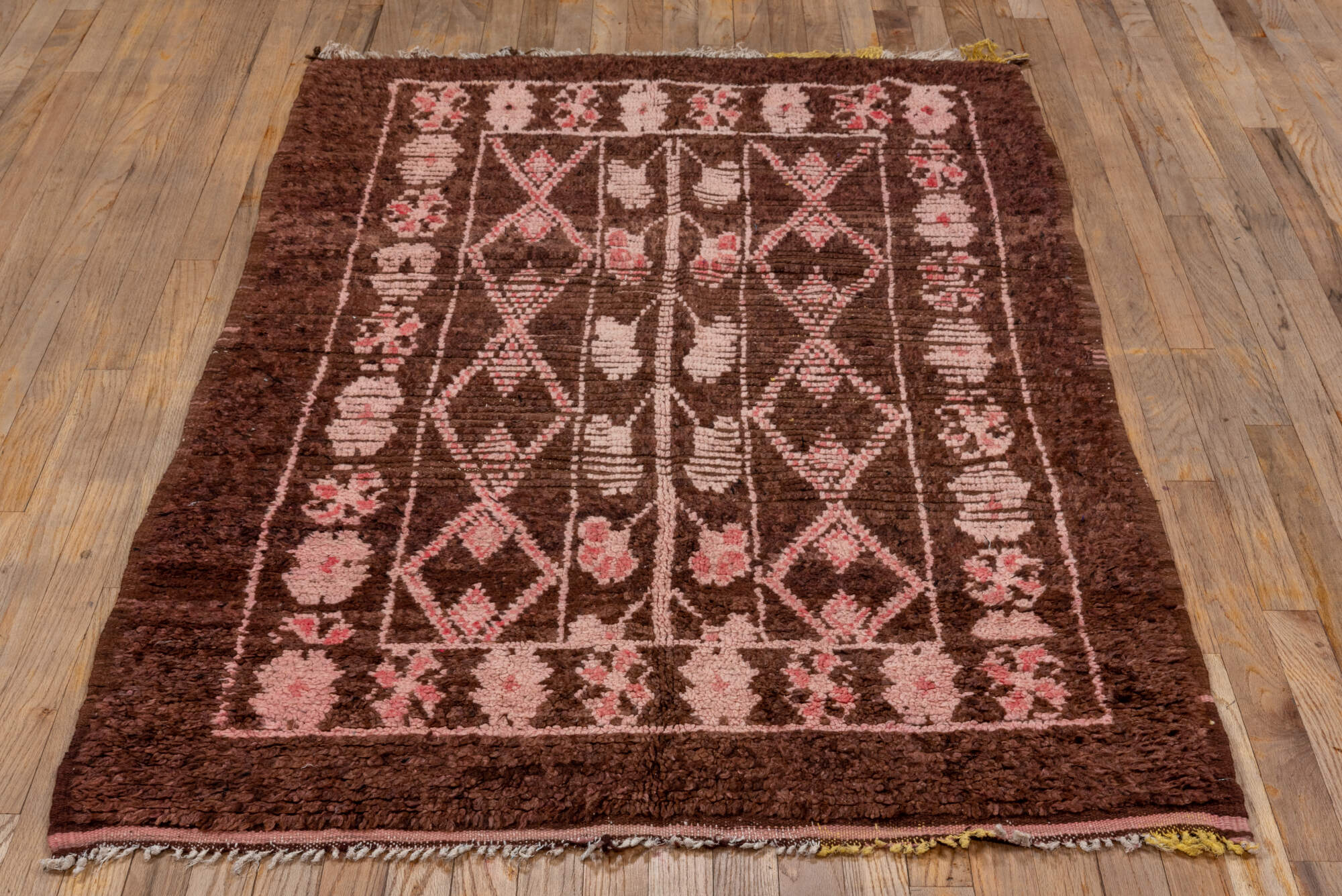 3' x 6' one-of-a-kind handmade vintage Moroccan small size rug. Color palette: brown, pink, red