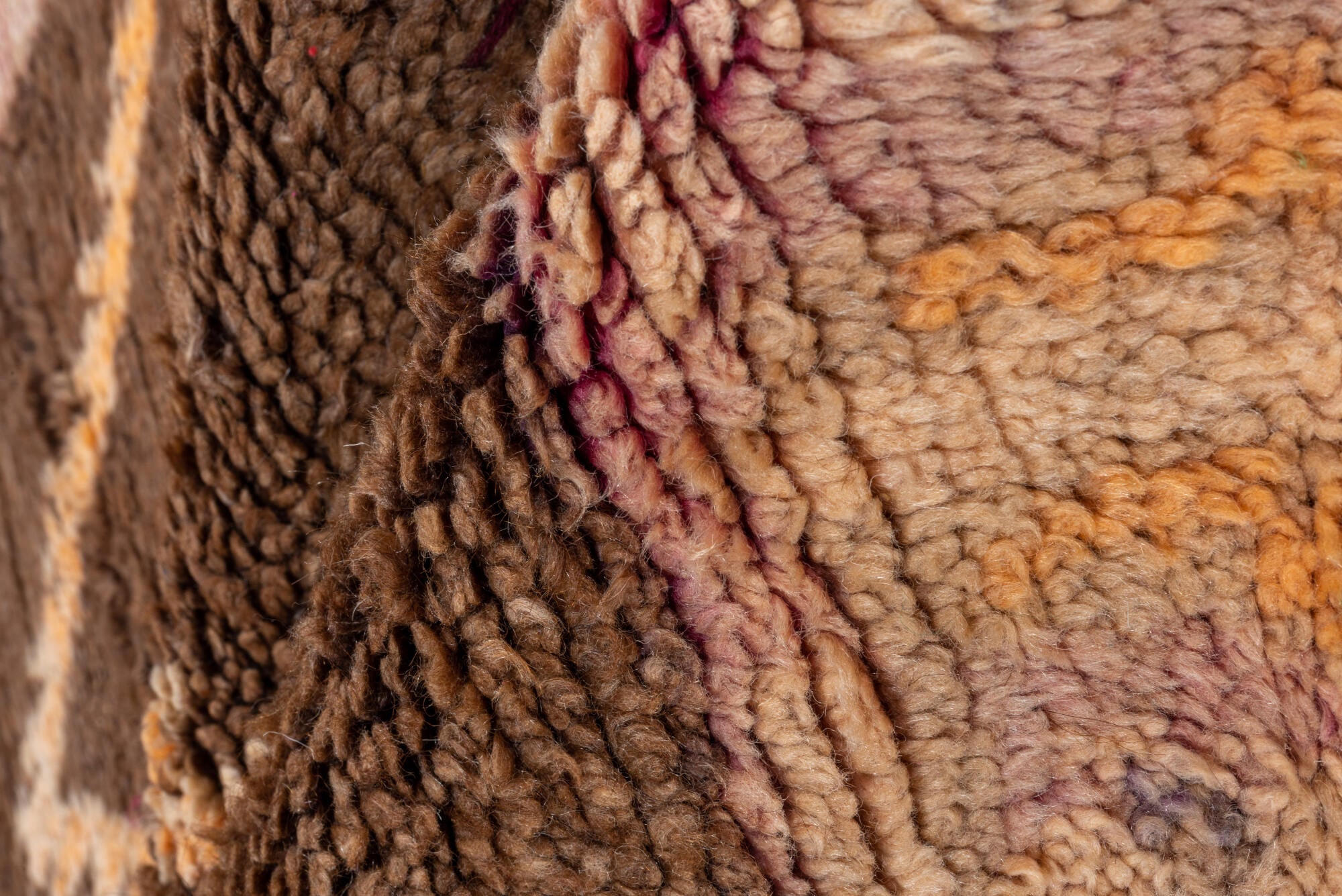 4' x 7' one-of-a-kind handmade vintage Moroccan rug. Color palette: black, blue, brown, gray, off-white, orange, pink