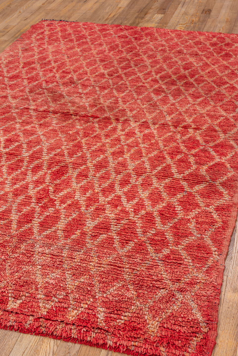 4' x 8' one-of-a-kind handmade vintage Moroccan rug. Color palette: brown, red, pink, fire brick