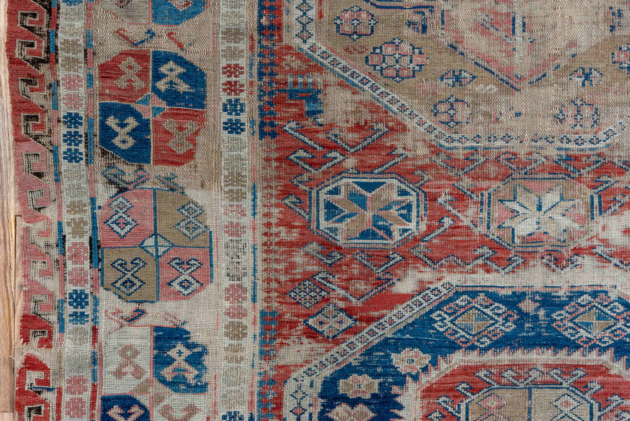 3' x 6' one-of-a-kind handmade vintage Sumak small size rug. Color palette: brown, gray, blue, pink, light gray, off-white