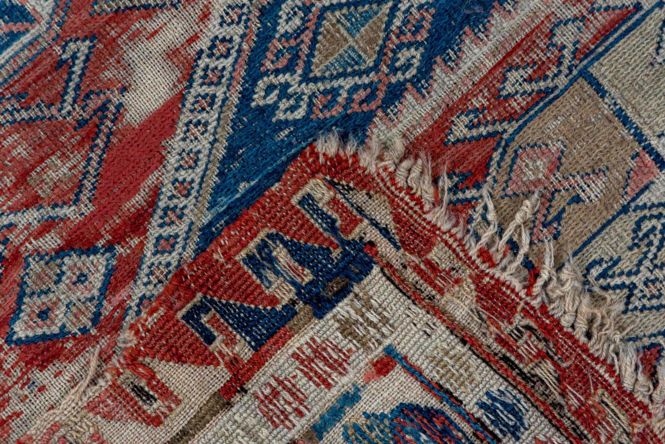 3' x 6' one-of-a-kind handmade vintage Sumak small size rug. Color palette: brown, gray, blue, pink, light gray, off-white