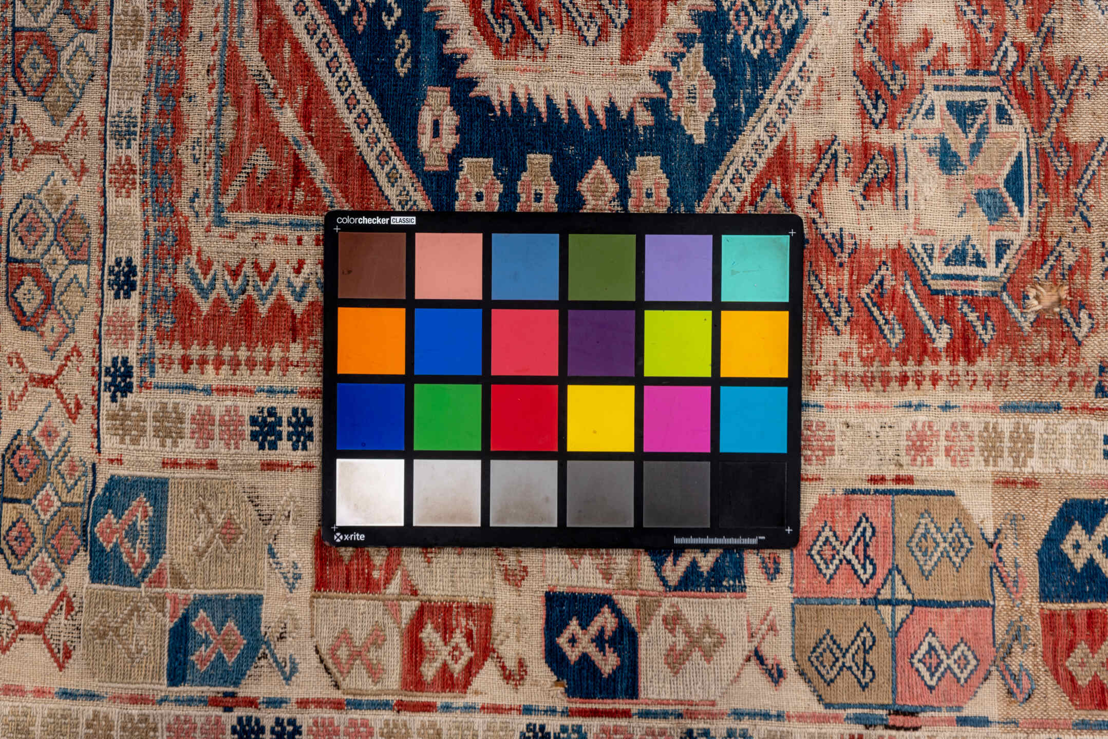 3' x 6' one-of-a-kind handmade vintage Sumak small size rug. Color palette: brown, gray, blue, pink, light gray, off-white