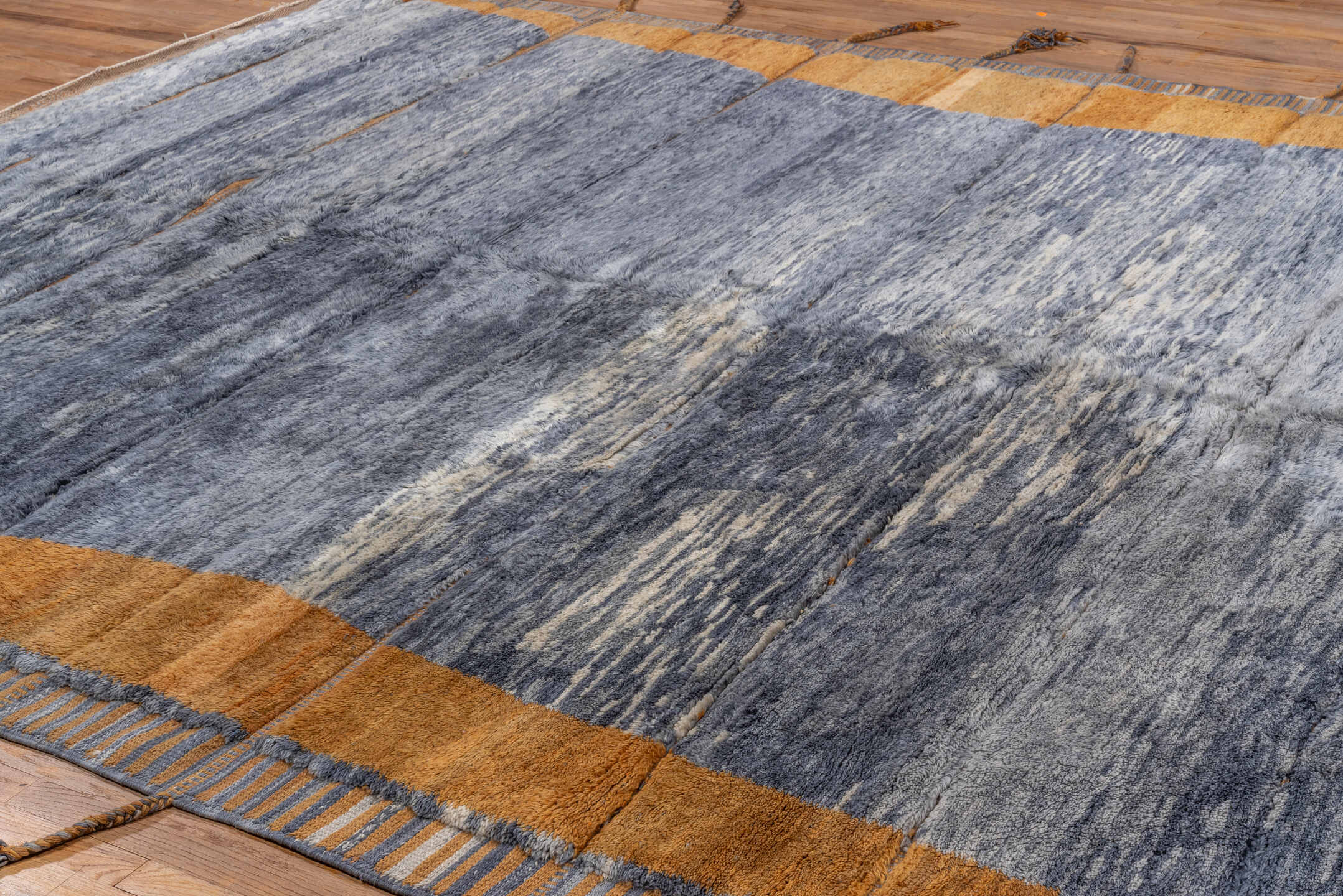 10' x 12' one-of-a-kind handmade vintage Moroccan large size rug. Color palette: brown, gray, light blue, black, light gray