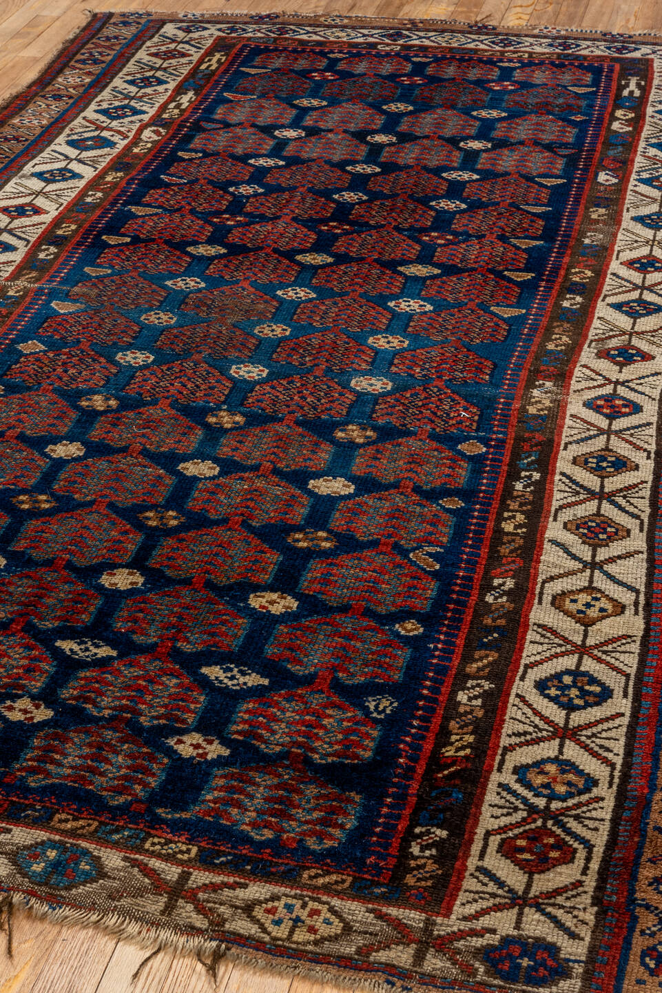 5' x 8' one-of-a-kind handmade vintage Kurd medium size rug. Color palette: brown, gray, red, blue, pink, dim gray