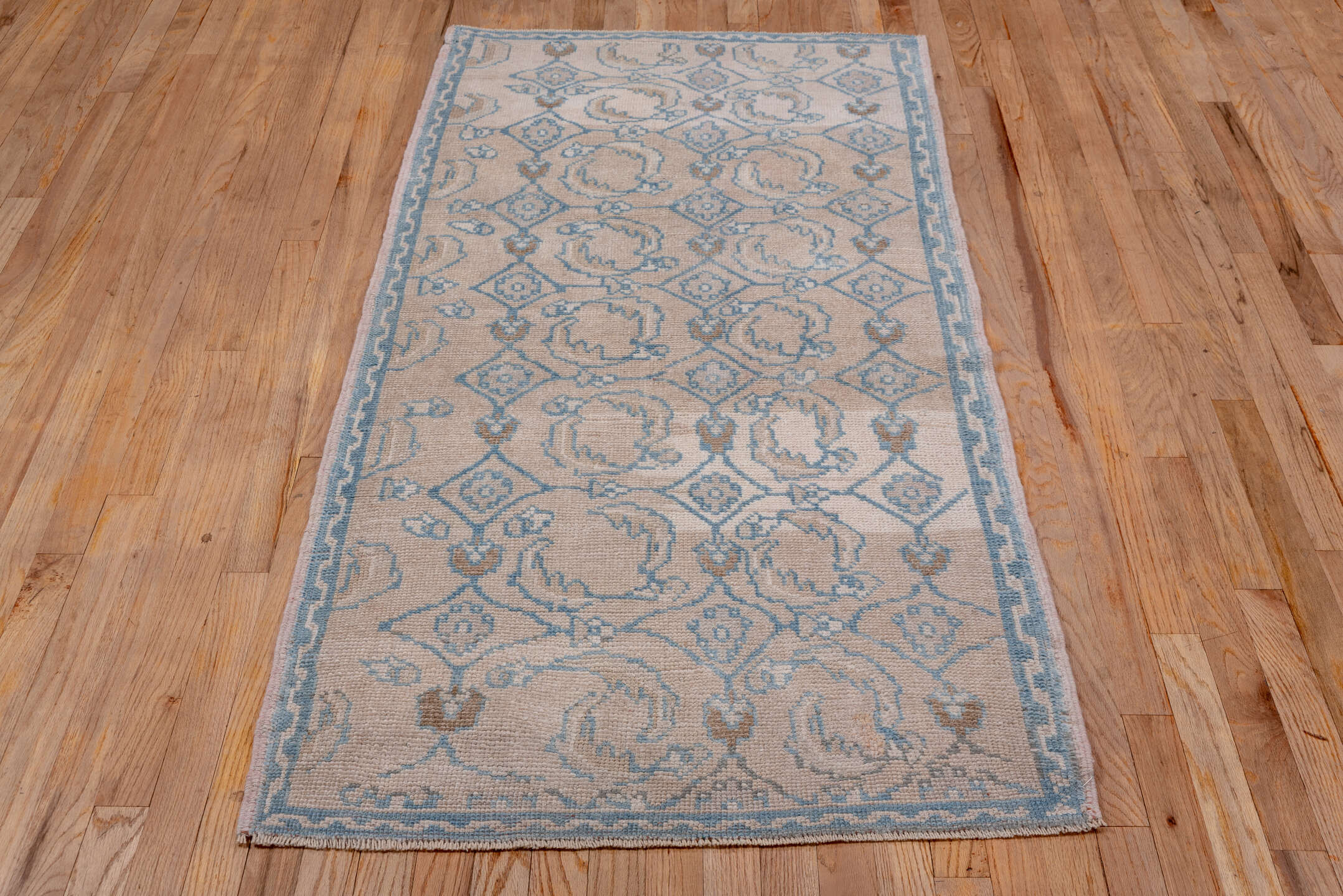 3' x 6' one-of-a-kind handmade vintage Oushak runner rug. Color palette: gray, light gray, off-white, pink, light blue