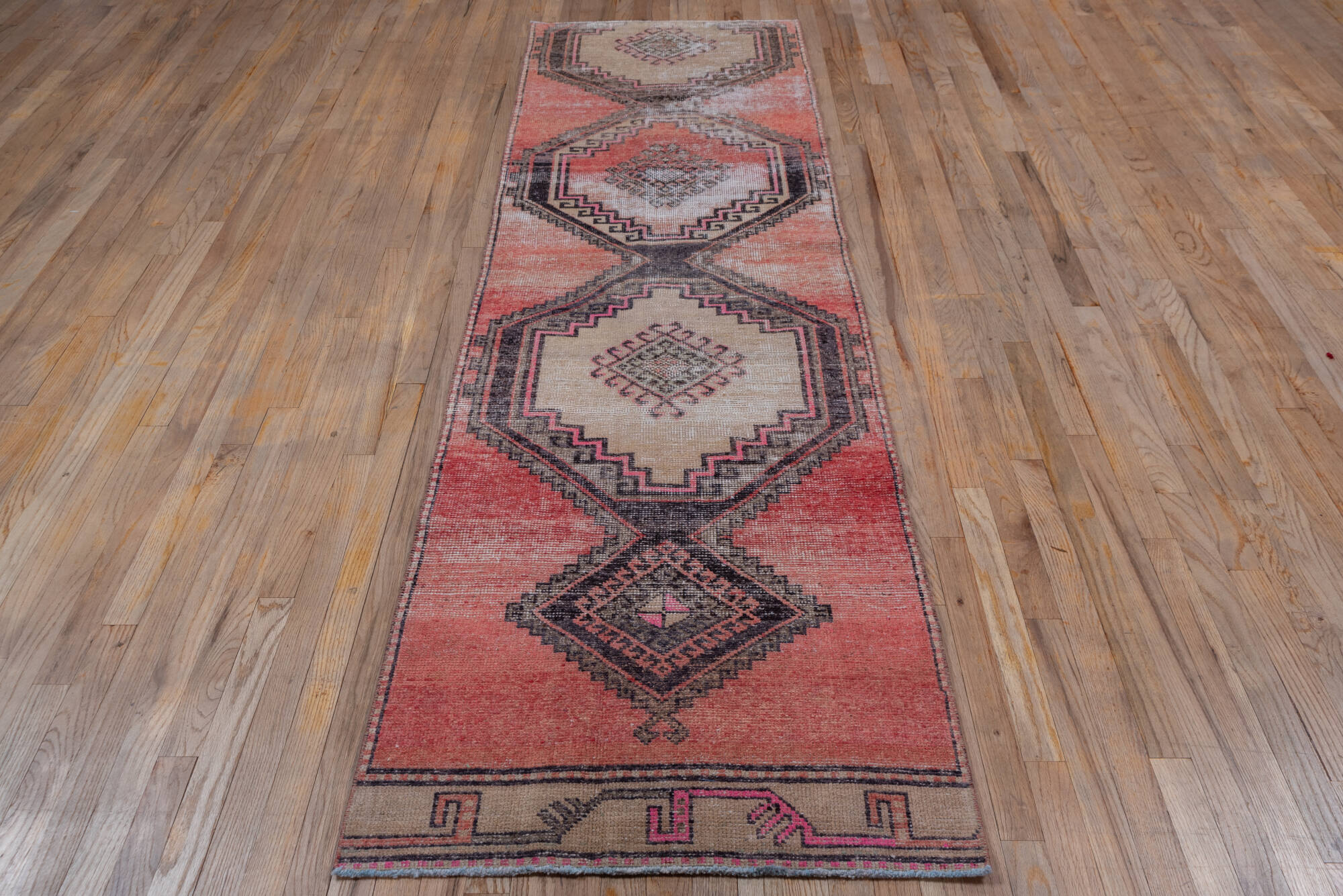 2' x 9' one-of-a-kind handmade vintage Oushak runner rug. Color palette: brown, gray, light gray, pink, red