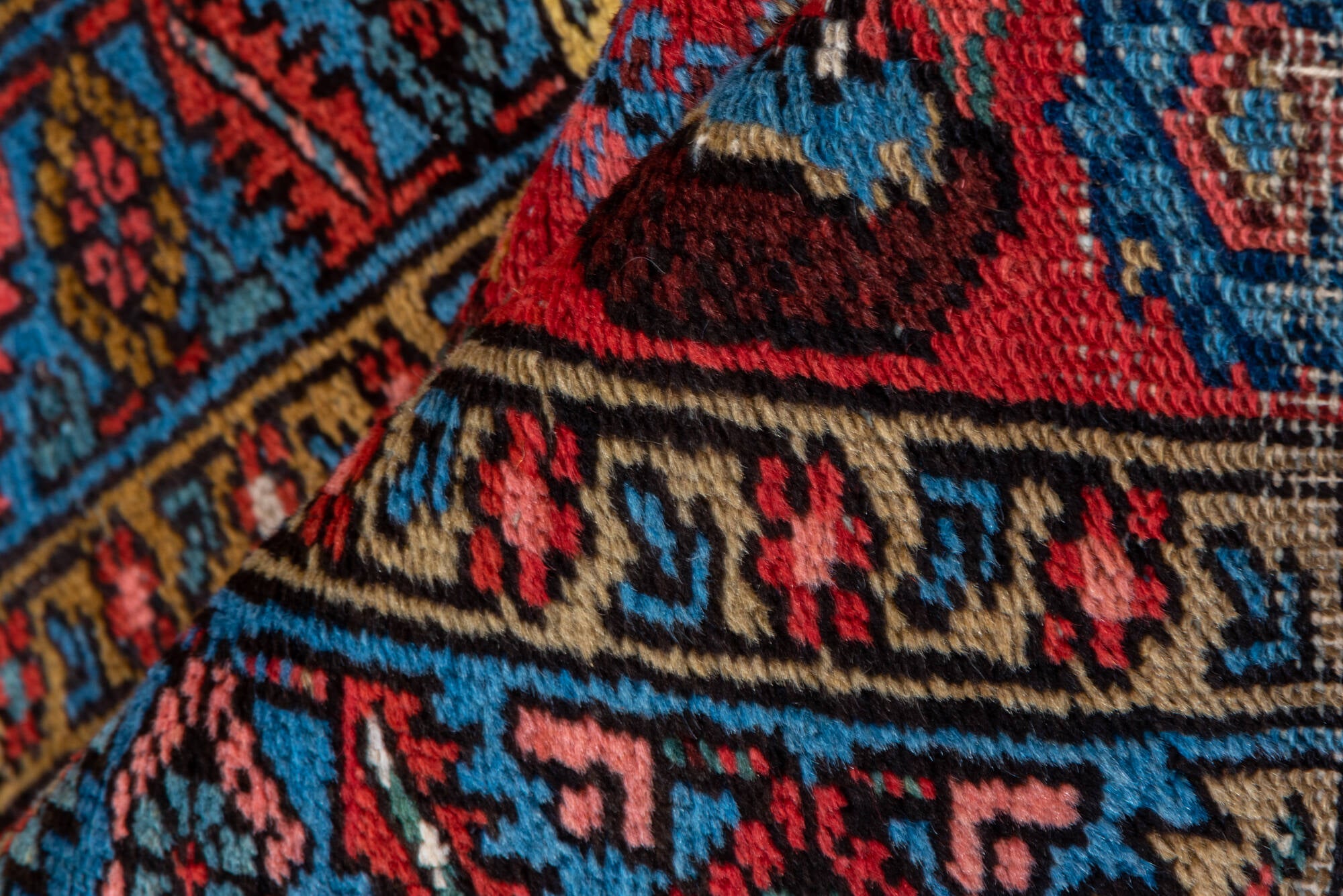 2' x 13' one-of-a-kind handmade vintage Heriz runner rug. Color palette: black, blue, brown, fiord, gray, indian red, pink