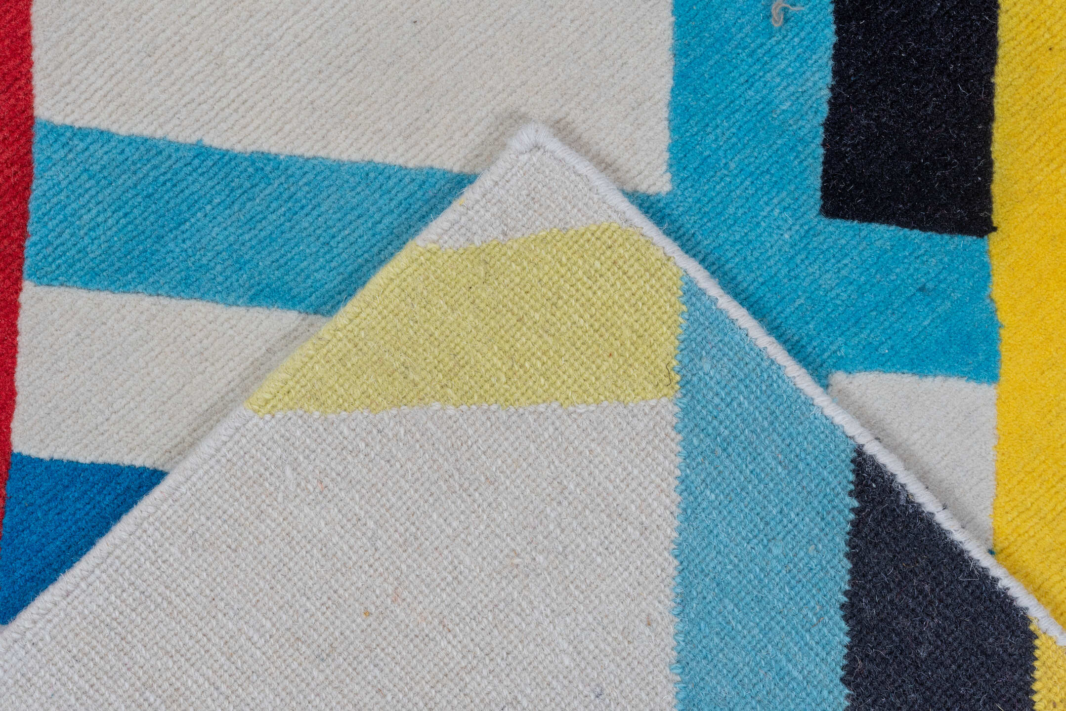 6' x 9' one-of-a-kind handmade vintage  medium size rug. Color palette: blue, black, pink, yellow, gray, off-white, red