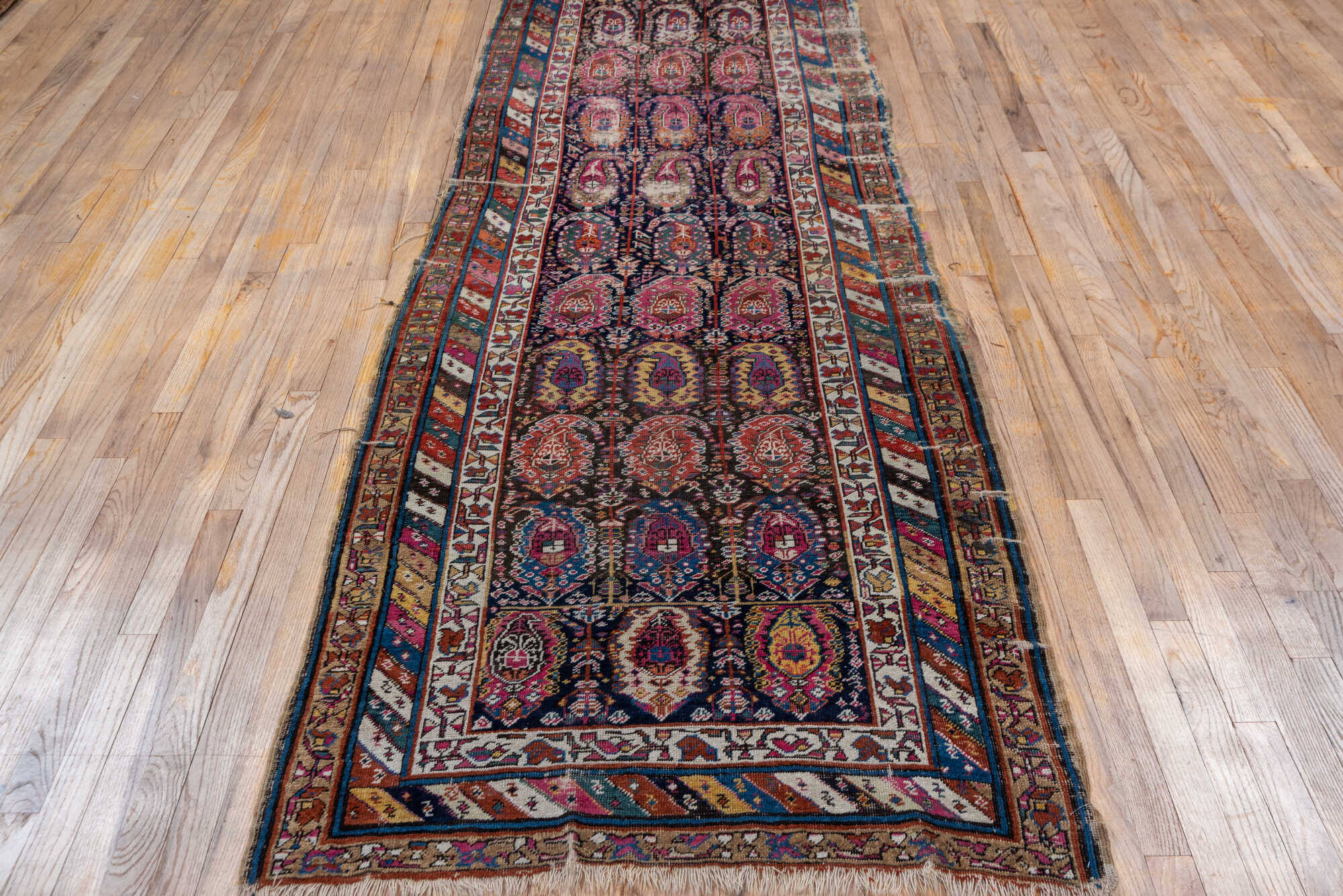 3' x 10' one-of-a-kind handmade vintage Shirvan runner rug. Color palette: black, blue, brown, fiord, gray, light gray