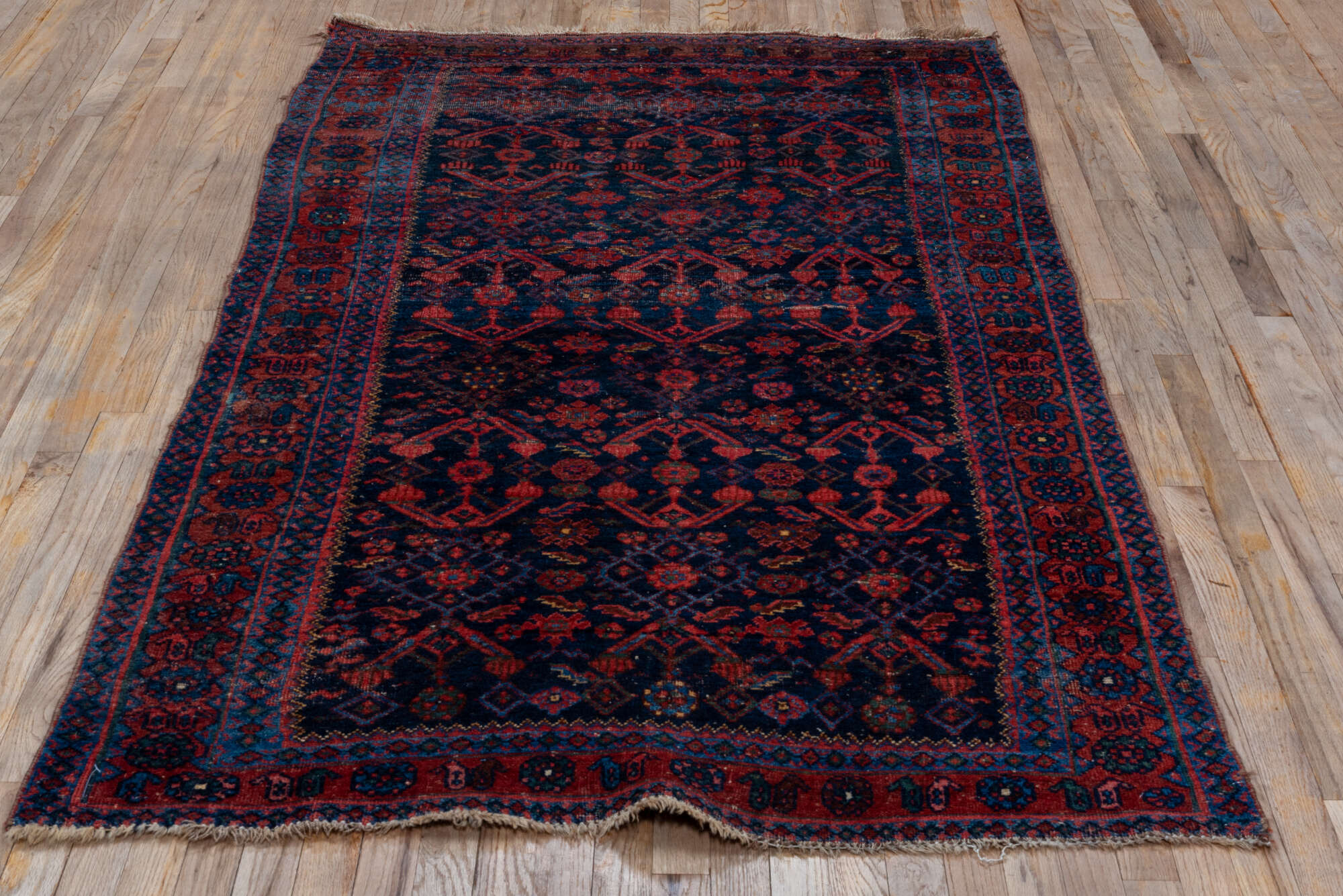 4' x 7' one-of-a-kind handmade vintage Bidjar rug. Color palette: black, brown, pink, red