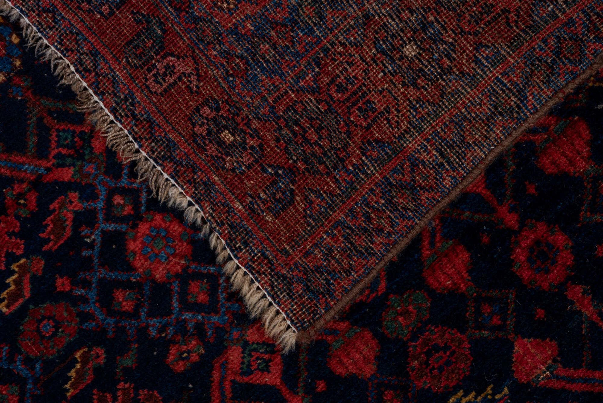 4' x 7' one-of-a-kind handmade vintage Bidjar rug. Color palette: black, brown, pink, red