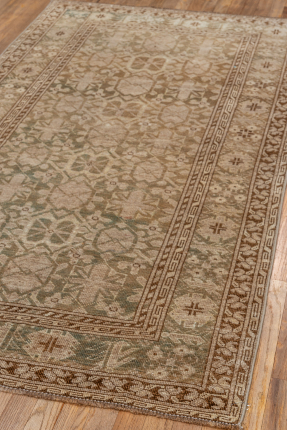 3' x 6' one-of-a-kind handmade vintage Afghan small size rug. Color palette: brown, pink, off-white