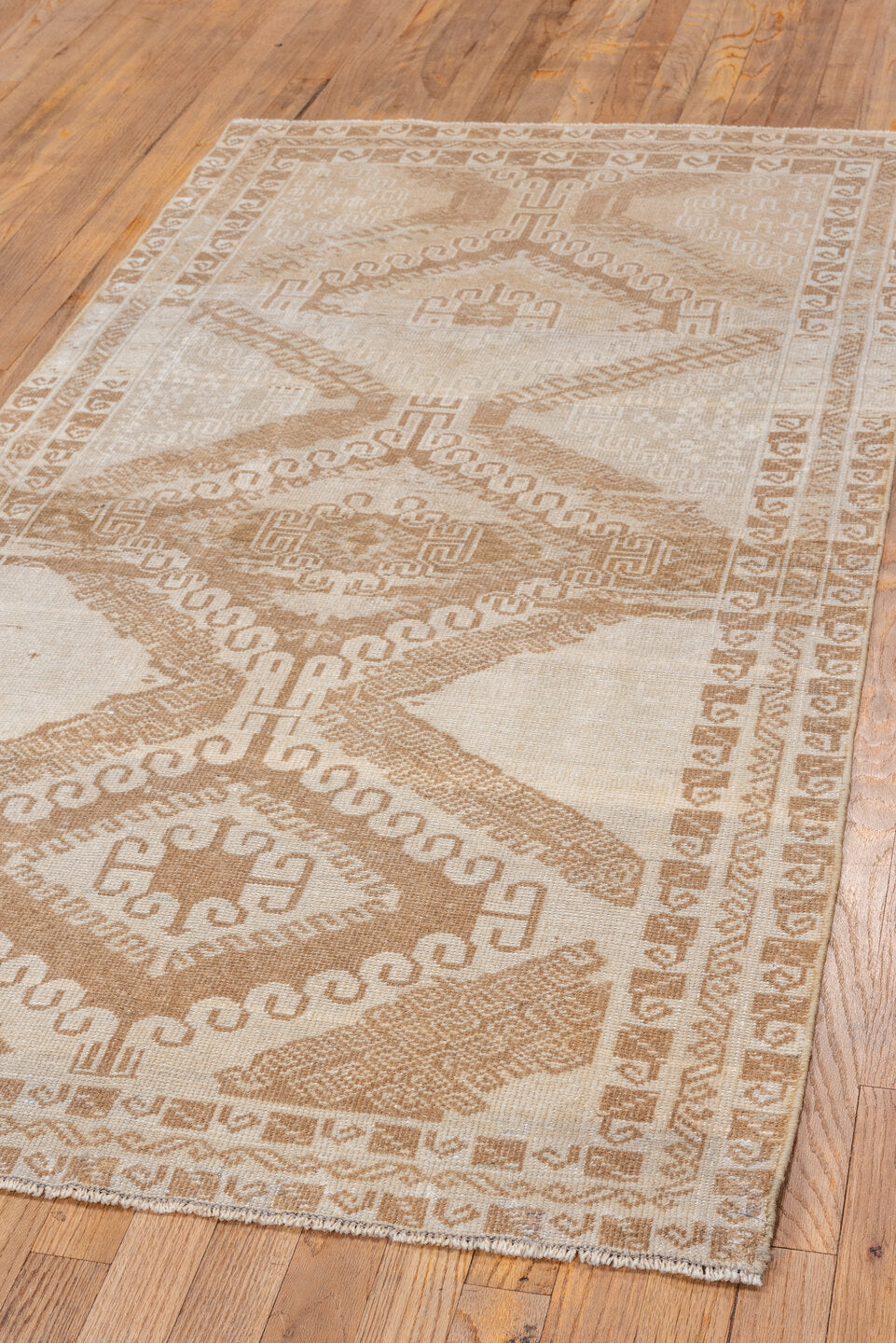 3' x 6' one-of-a-kind handmade vintage Belouch small size rug. Color palette: brown, gray, light gray, orange, off-white