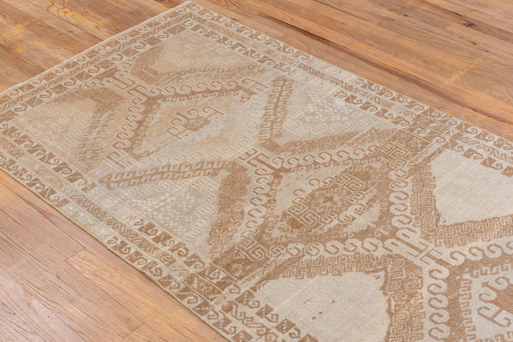 3' x 6' one-of-a-kind handmade vintage Belouch small size rug. Color palette: brown, gray, light gray, orange, off-white