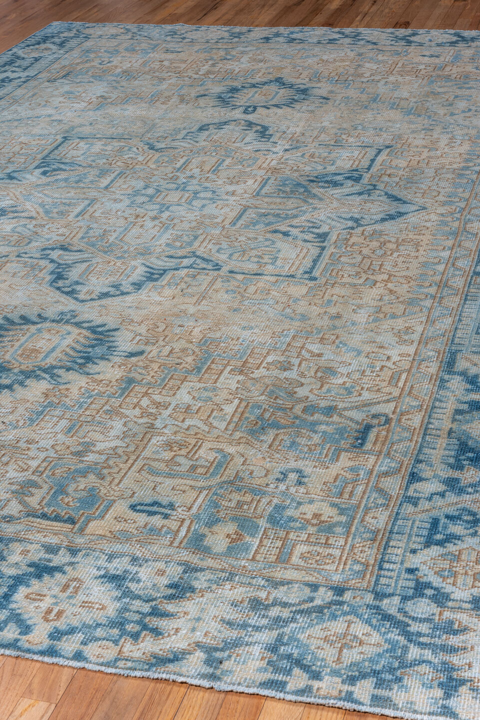 7' x 11' one-of-a-kind handmade vintage Heriz large size rug. Color palette: gray, light gray, off-white, light blue, blue