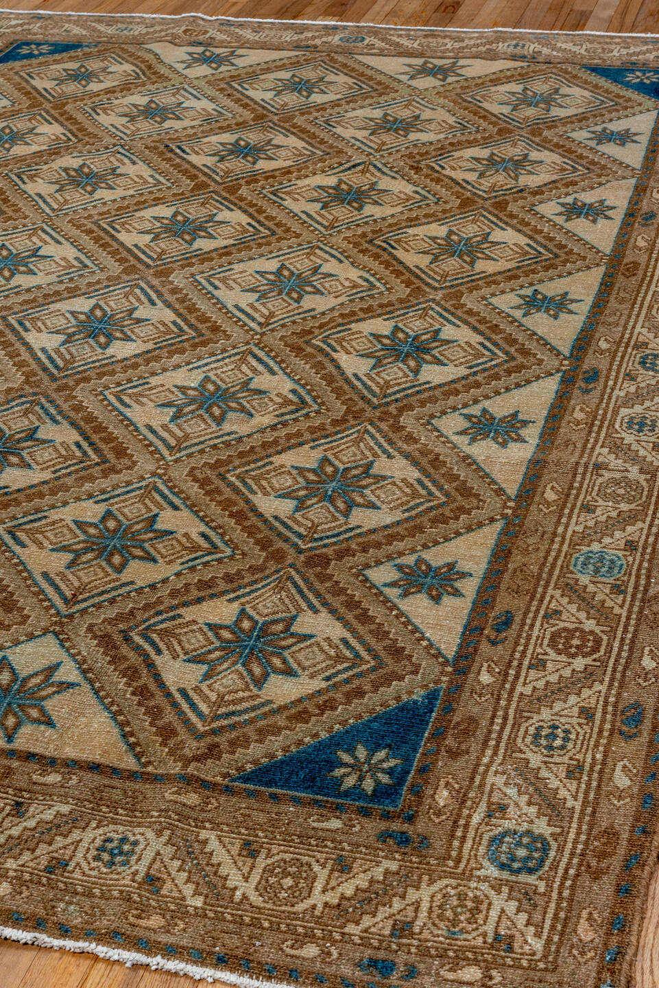 7' x 9' one-of-a-kind handmade vintage Malayer rug. Color palette: gray, brown, blue, black, light gray, off-white, charcoal