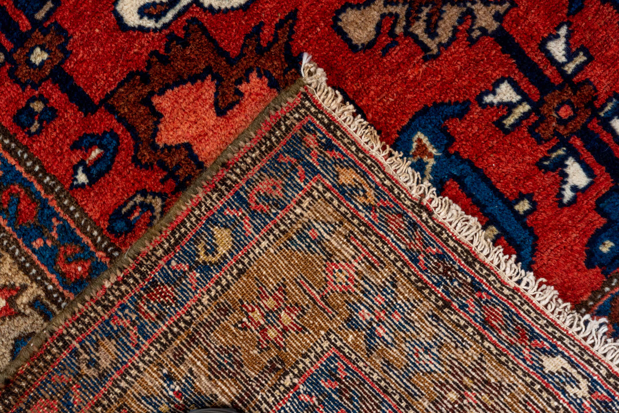 3' x 9' one-of-a-kind handmade vintage Malayer runner rug. Color palette: red, brown, gray, pink, black, orange, off-white