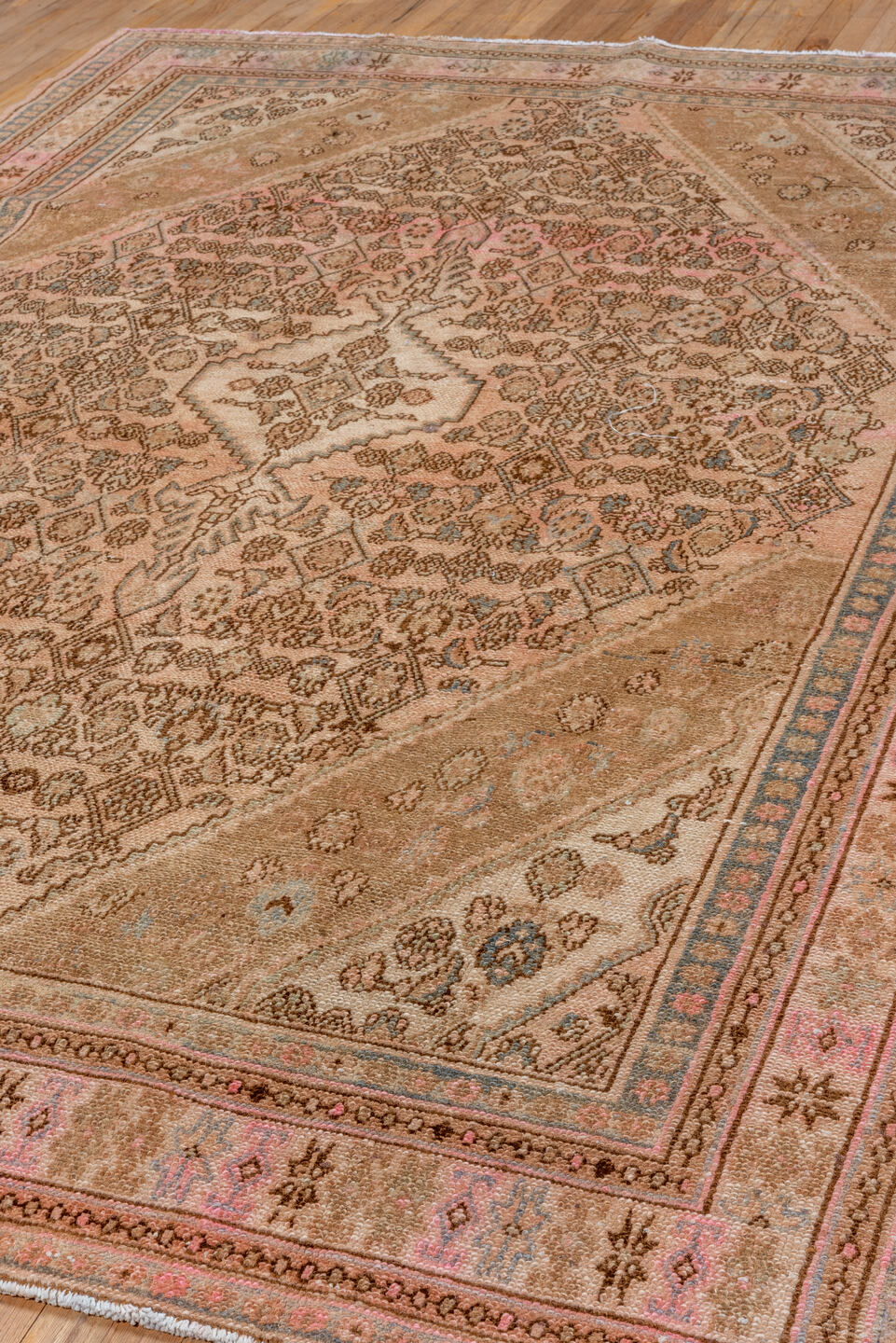 7' x 10' one-of-a-kind handmade vintage Hamadan large size rug. Color palette: brown, gray, orange, off-white, pink, tan