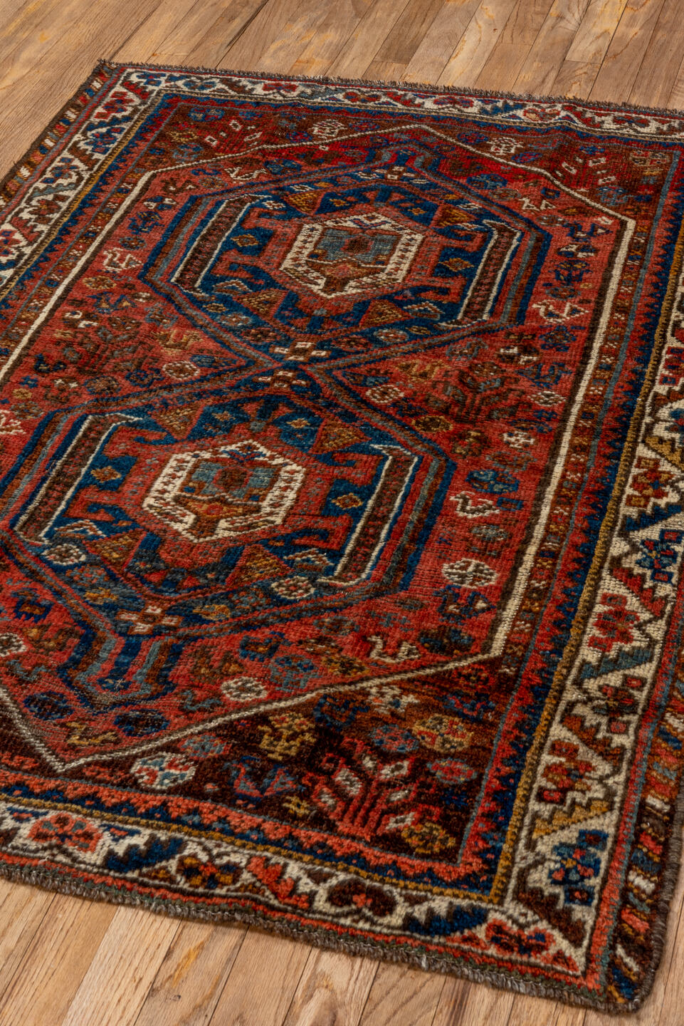3' x 4' one-of-a-kind handmade vintage Shiraz small size rug. Color palette: gray, red, brown, pink, blue, off-white, fiord