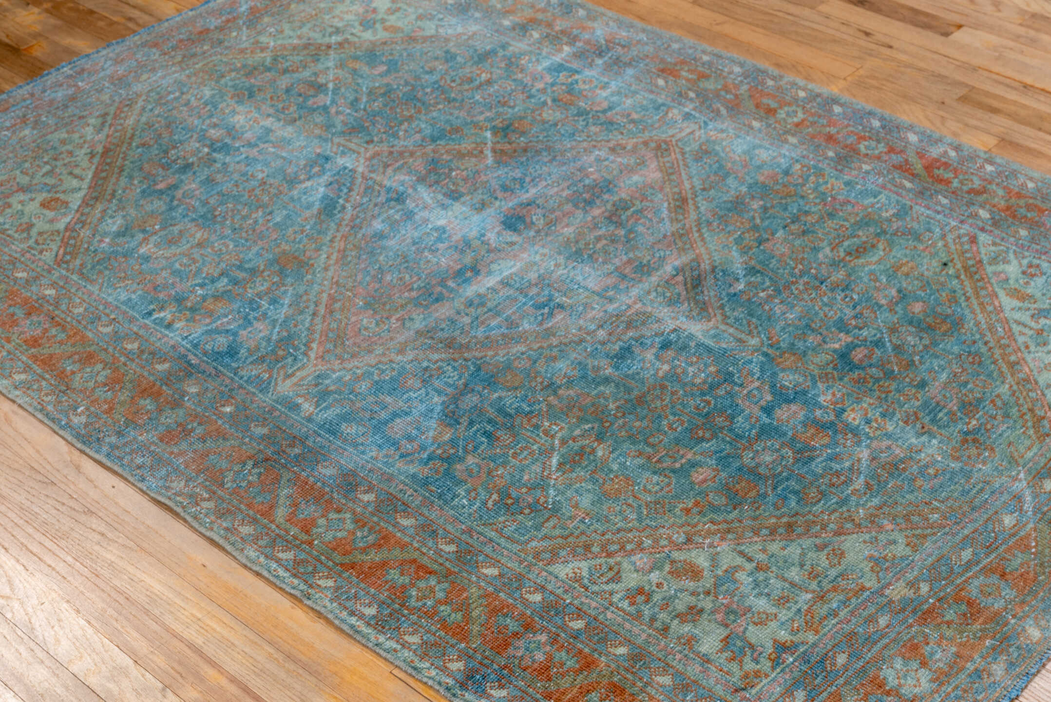 4' x 6' one-of-a-kind handmade vintage Mahal small size rug. Color palette: blue, gray, light blue, brown, light gray, black