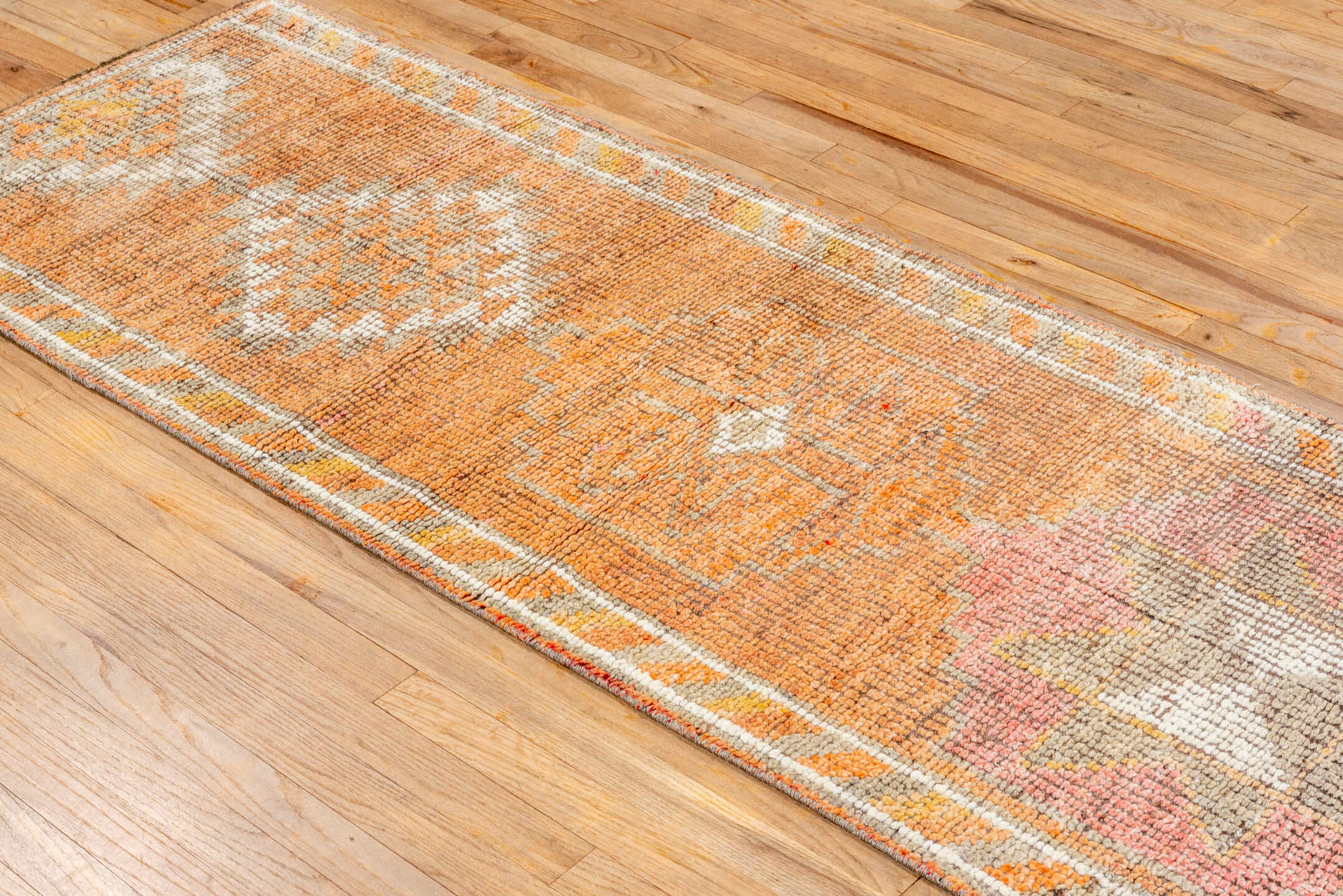 2' x 11' one-of-a-kind handmade vintage Oushak runner rug. Color palette: brown, pink, off-white, light gray, gray, orange