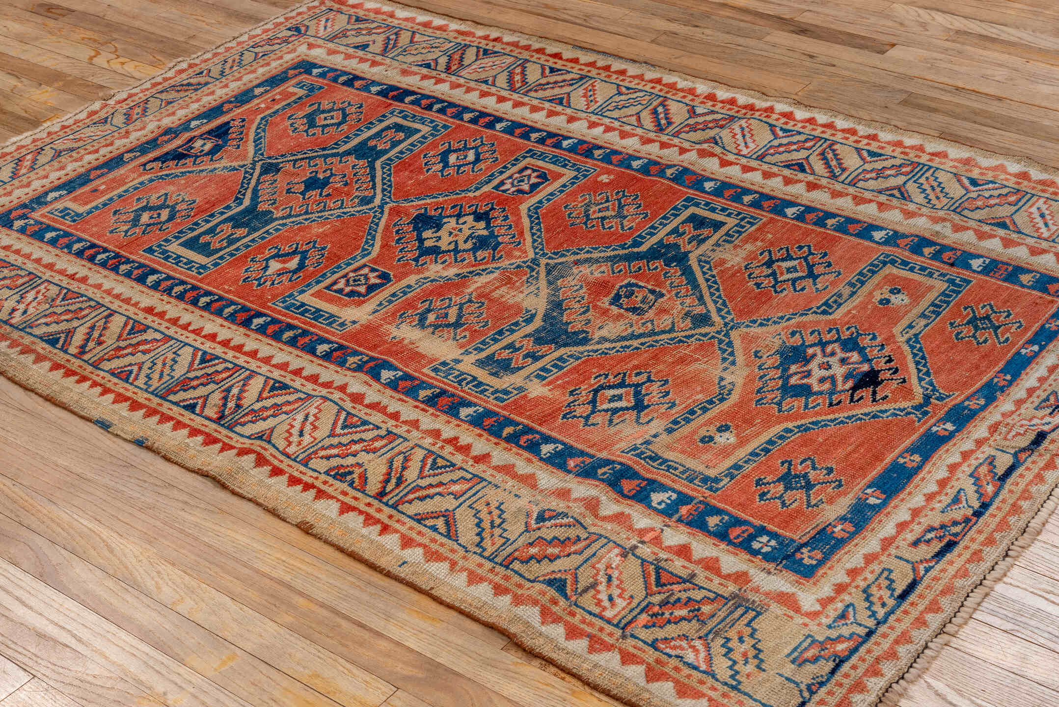 4' x 6' one-of-a-kind handmade vintage Shirvan small size rug. Color palette: brown, pink, red, gray, orange, off-white