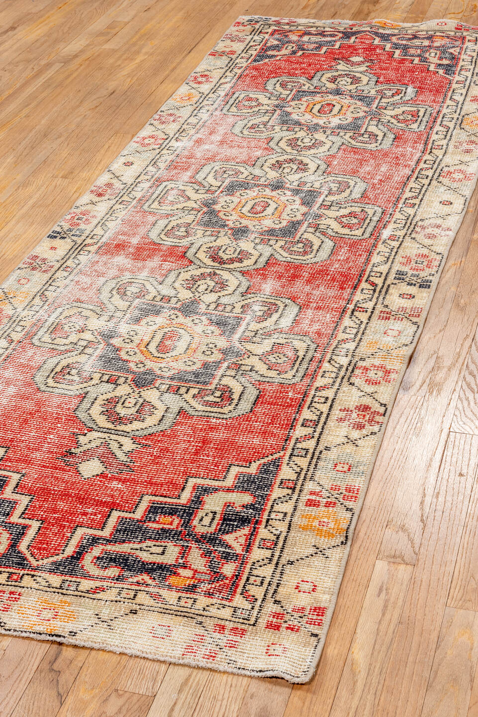2' x 8' one-of-a-kind handmade vintage Oushak runner rug. Color palette: pink, gray, brown, red, orange, off-white