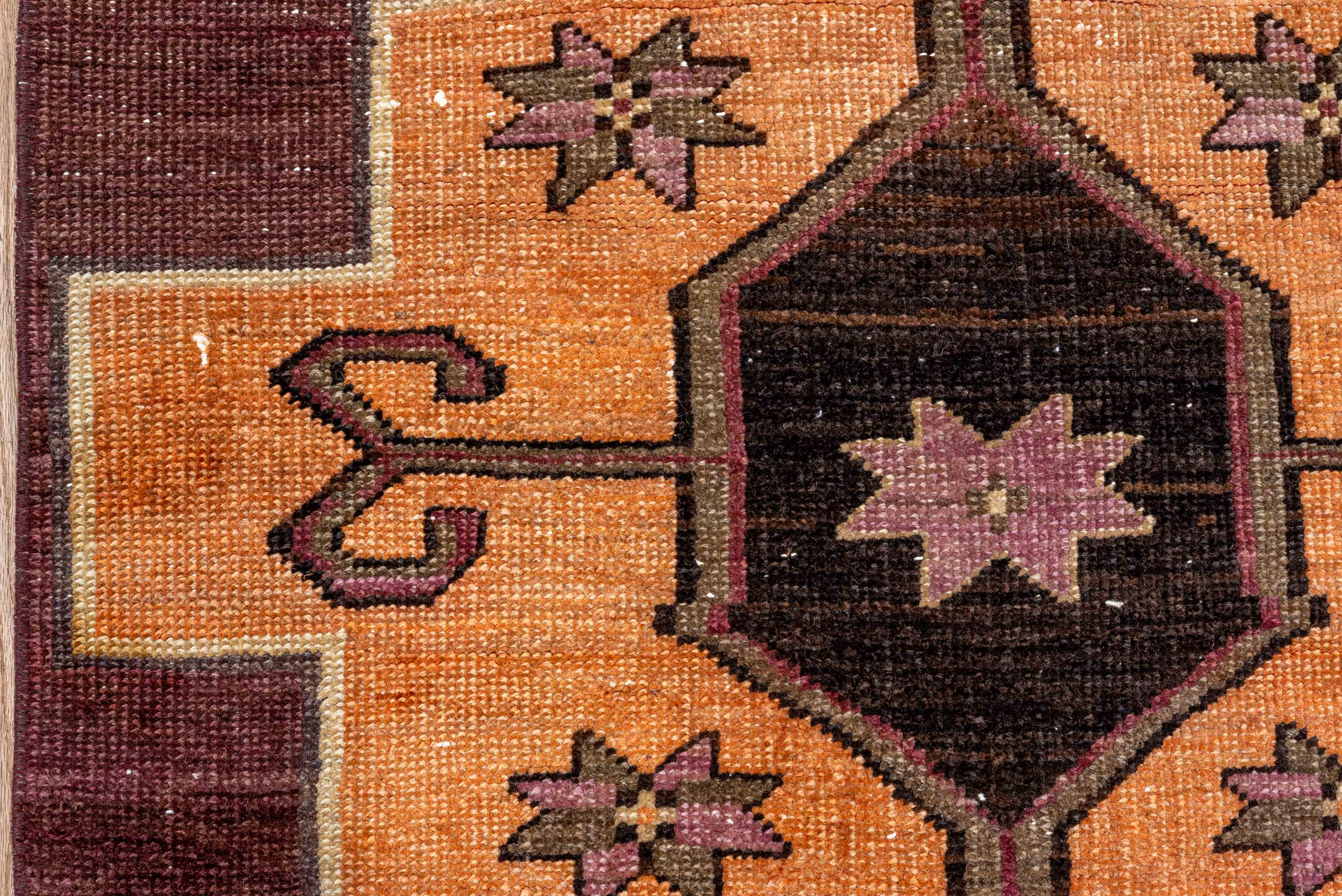 2' x 8' one-of-a-kind handmade vintage Kars runner rug. Color palette: brown, red, orange, pink, black, chocolate, redwood