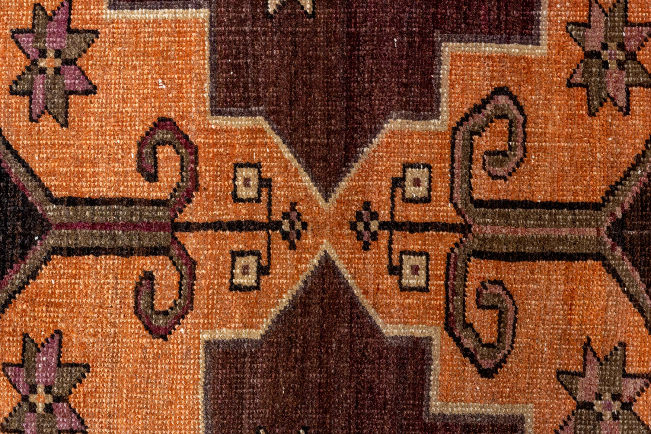 2' x 8' one-of-a-kind handmade vintage Kars runner rug. Color palette: brown, red, orange, pink, black, chocolate, redwood