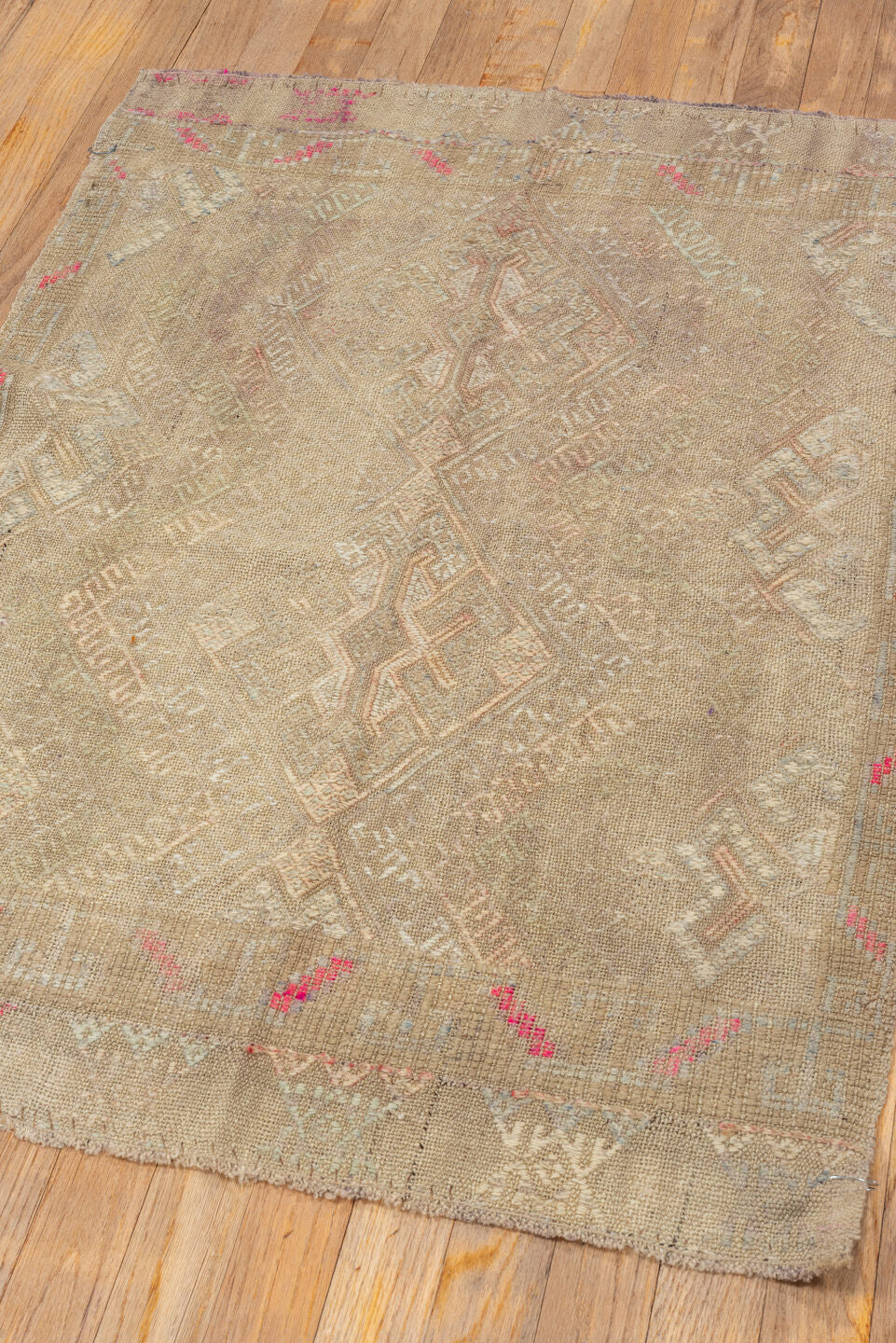 2' x 3' one-of-a-kind handmade vintage Jijim small size rug. Color palette: pink, brown, red