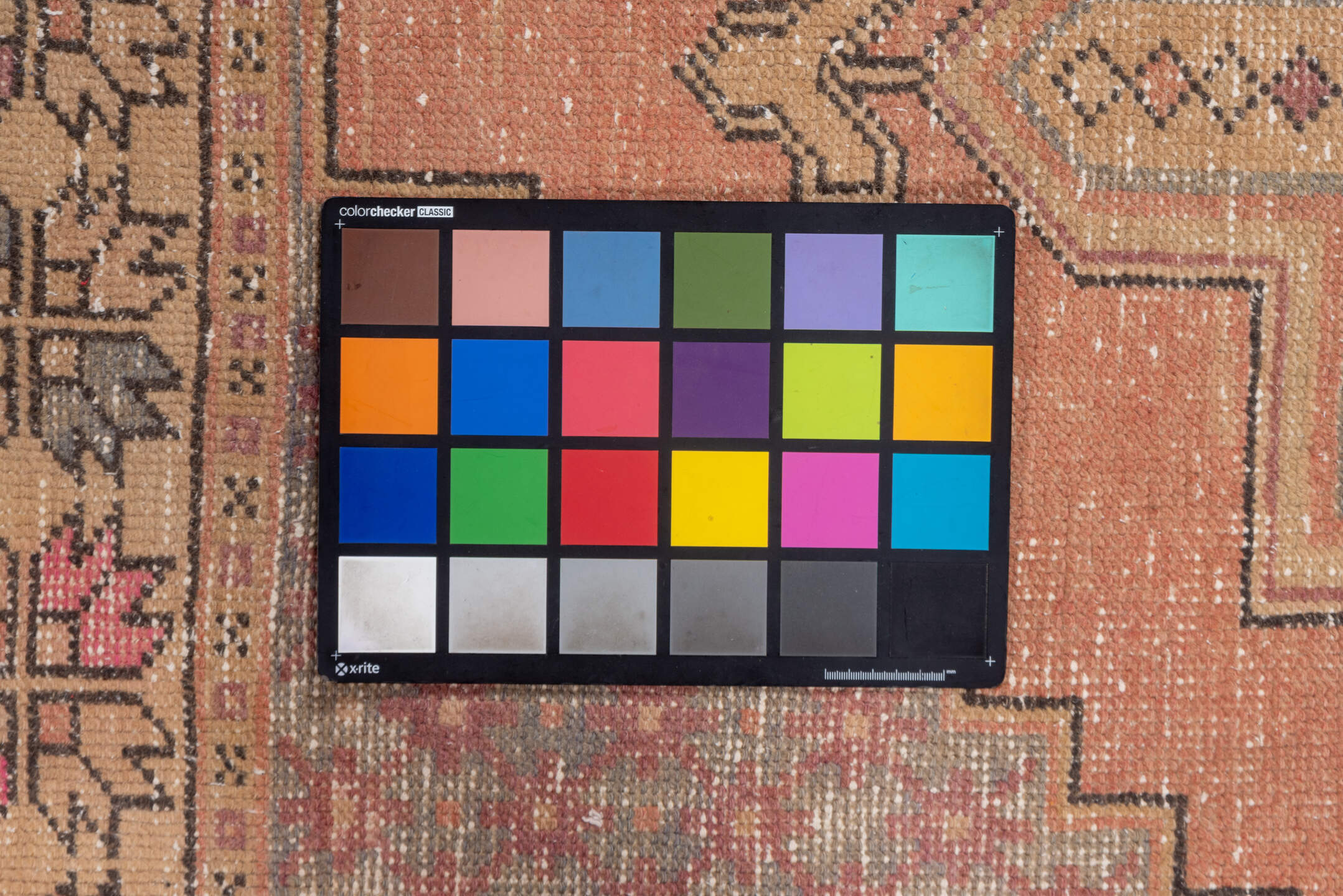 3' x 9' one-of-a-kind handmade vintage Oushak runner rug. Color palette: brown, orange, gray, pink, light gray, off-white