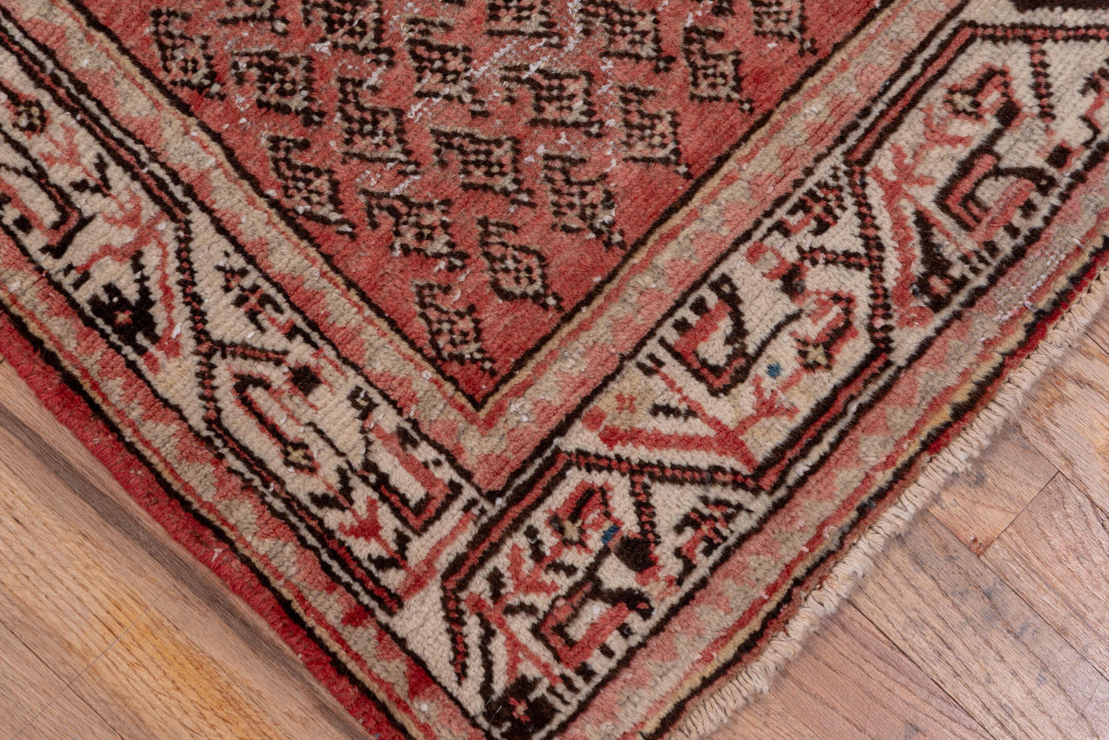 2' x 10' one-of-a-kind handmade vintage Mahal runner rug. Color palette: pink, gray, brown, red, redwood