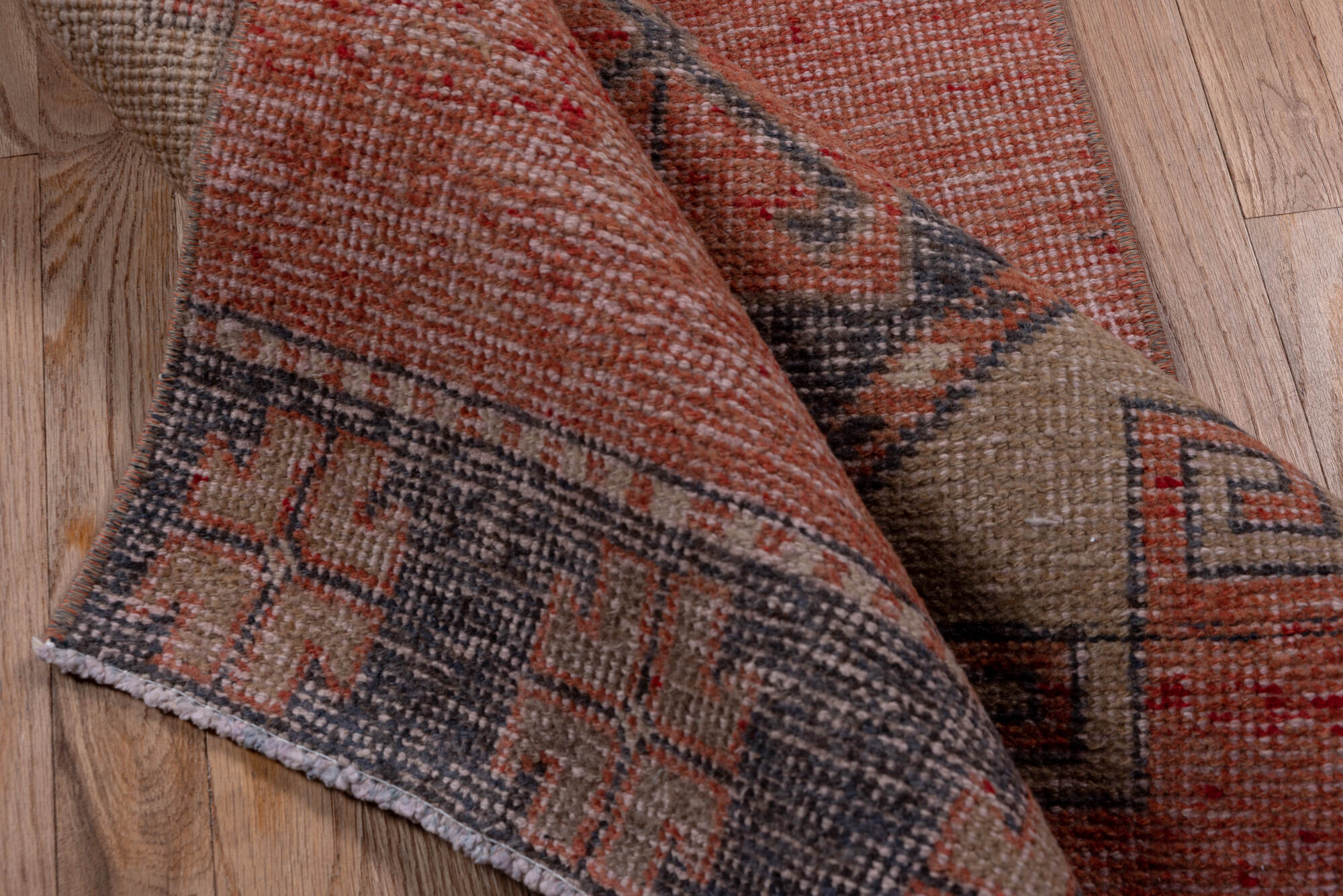 2' x 11' one-of-a-kind handmade vintage Oushak runner rug. Color palette: brown, gray, off-white, pink, red, snow, white