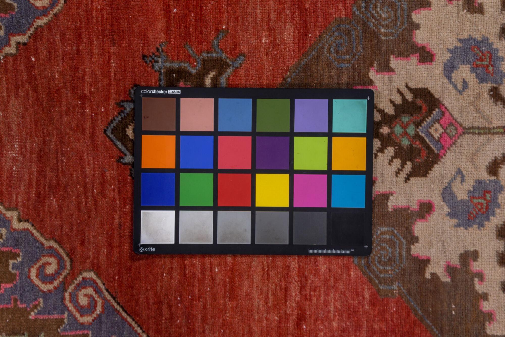 2' x 10' one-of-a-kind handmade vintage Oushak runner rug. Color palette: brown, gray, indian red, pink, red, redwood