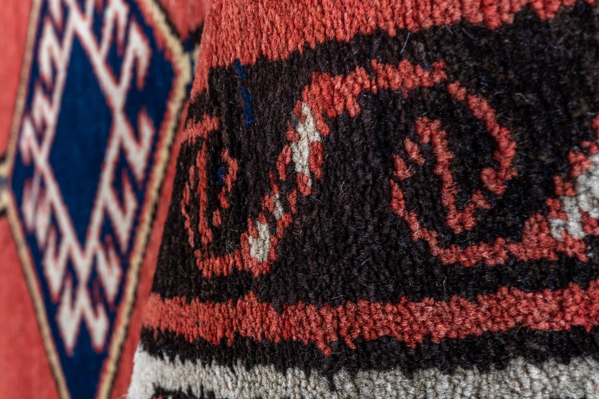 2' x 9' one-of-a-kind handmade vintage Sarab runner rug. Color palette: black, brown, gray, off-white, pink, red, snow