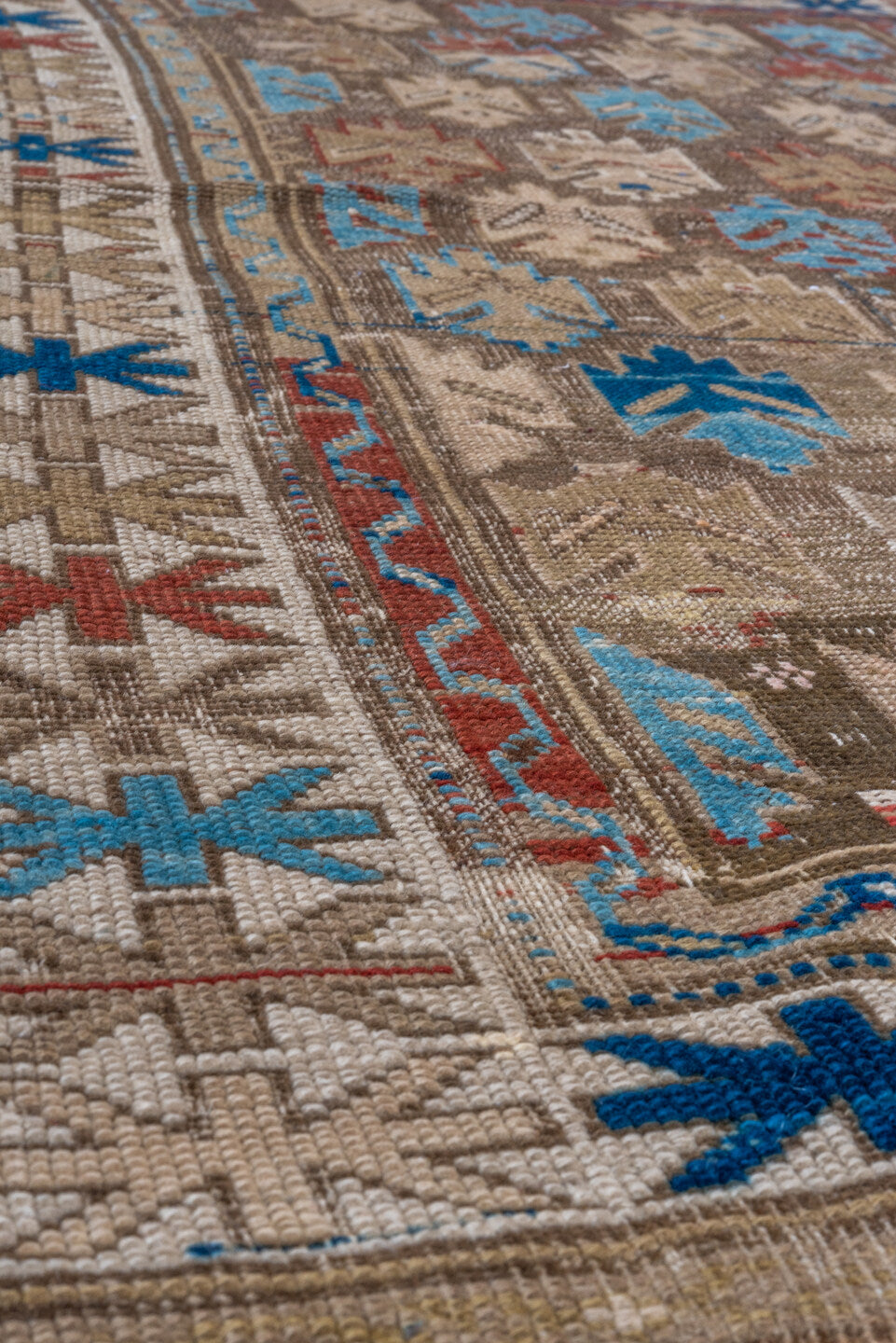 3' x 4' one-of-a-kind handmade vintage Caucasian small size rug. Color palette: gray, blue, red, brown
