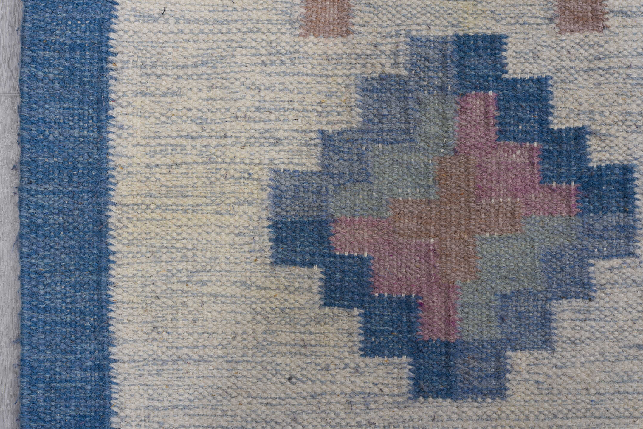 6' x 9' one-of-a-kind handmade vintage Rollaken medium size rug. Color palette: gray, blue, light gray, off-white, brown