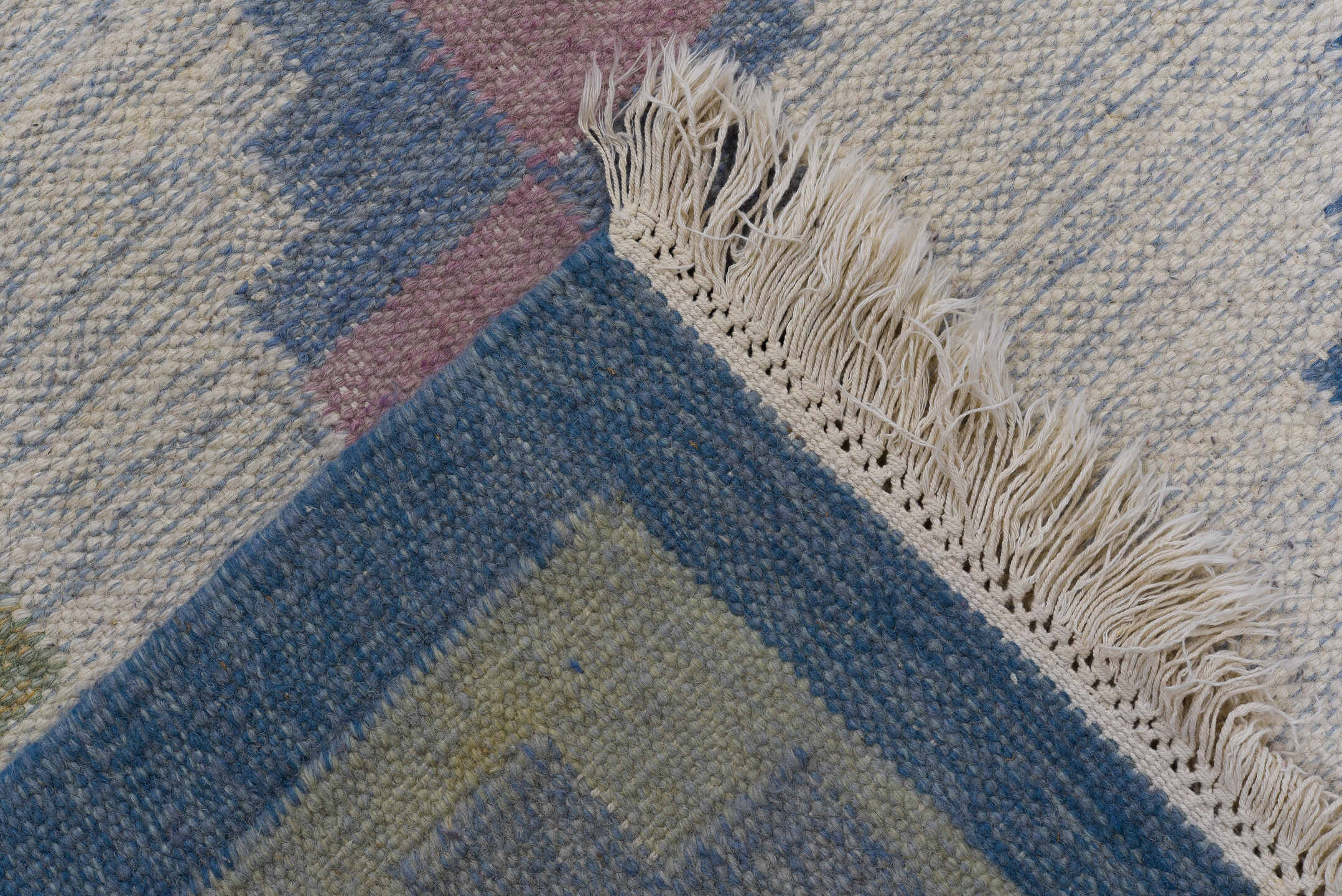 6' x 9' one-of-a-kind handmade vintage Rollaken medium size rug. Color palette: gray, blue, light gray, off-white, brown